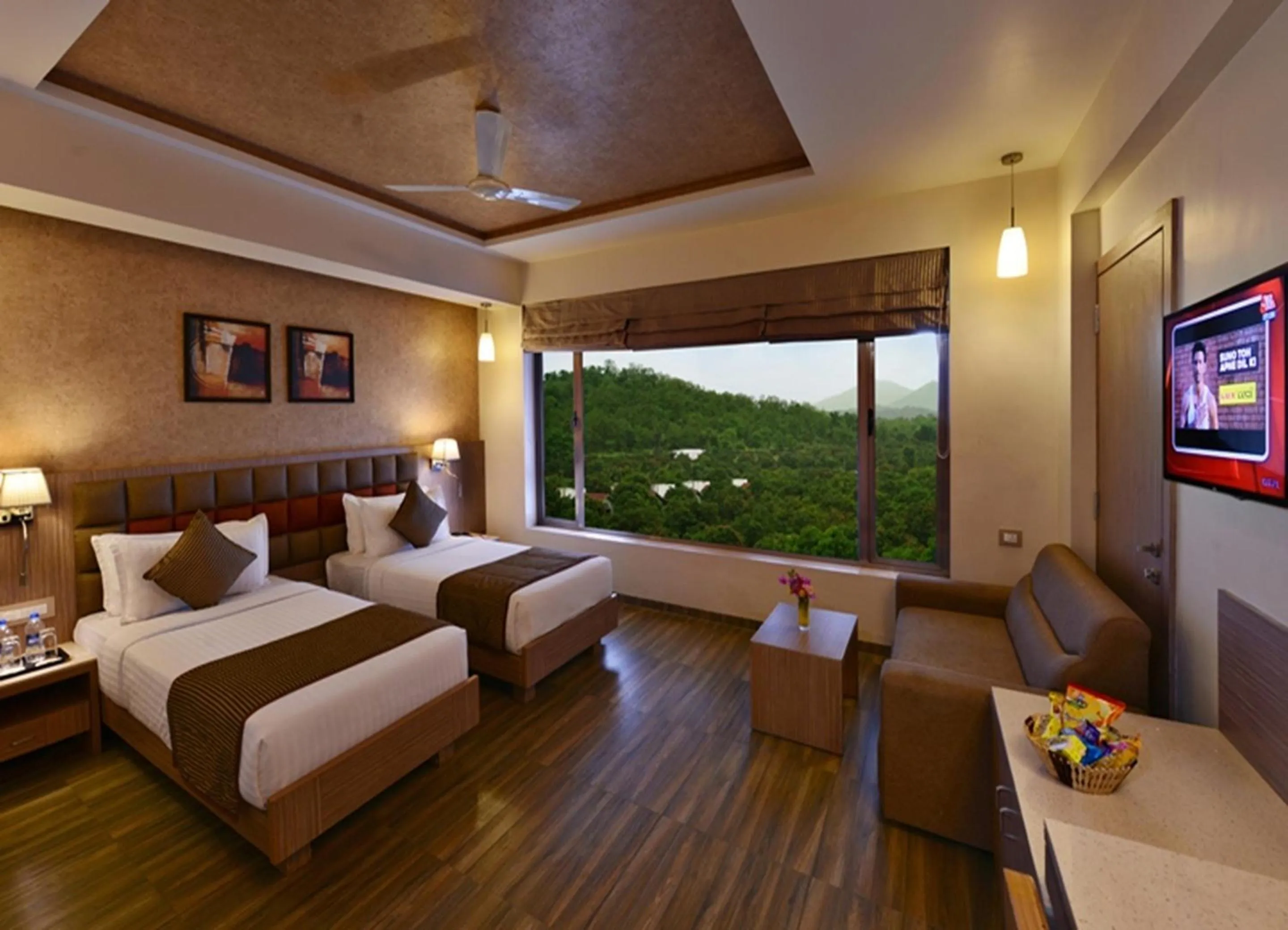 Photo of the whole room, Bed in Sarovar Portico Sasangir
