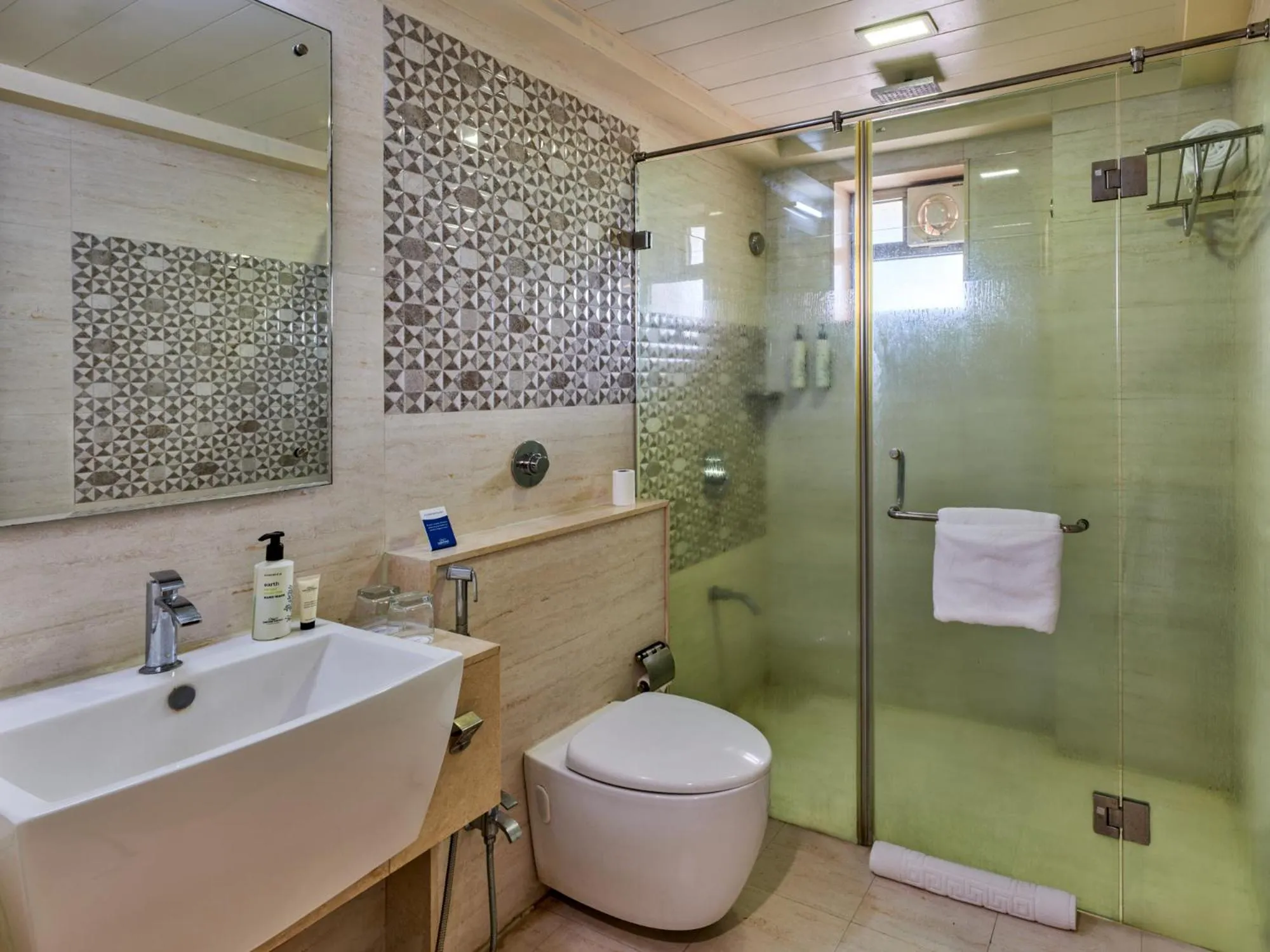 Bathroom in Sarovar Portico Sasangir