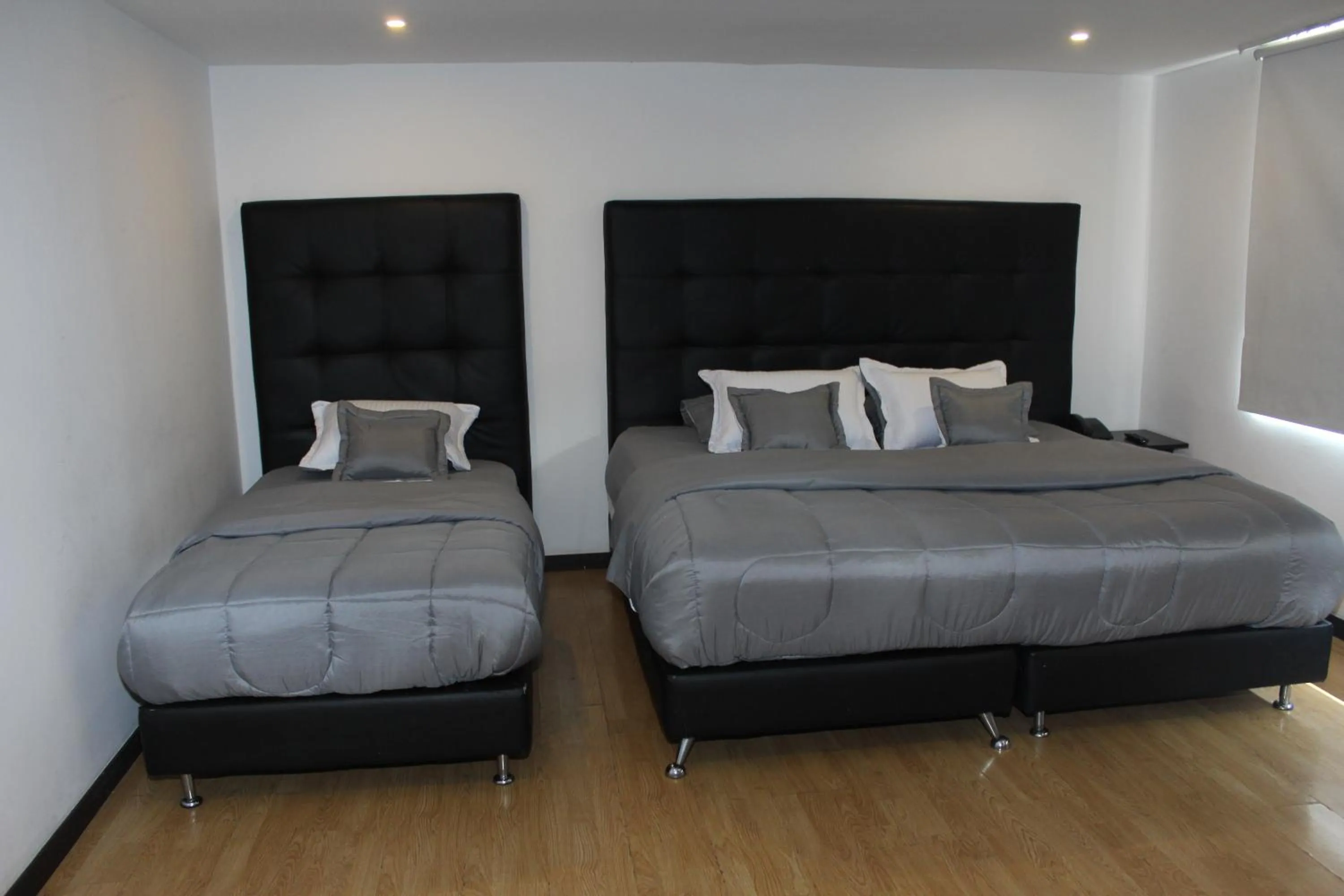 Bed in Hotel Montecarlo Boutique