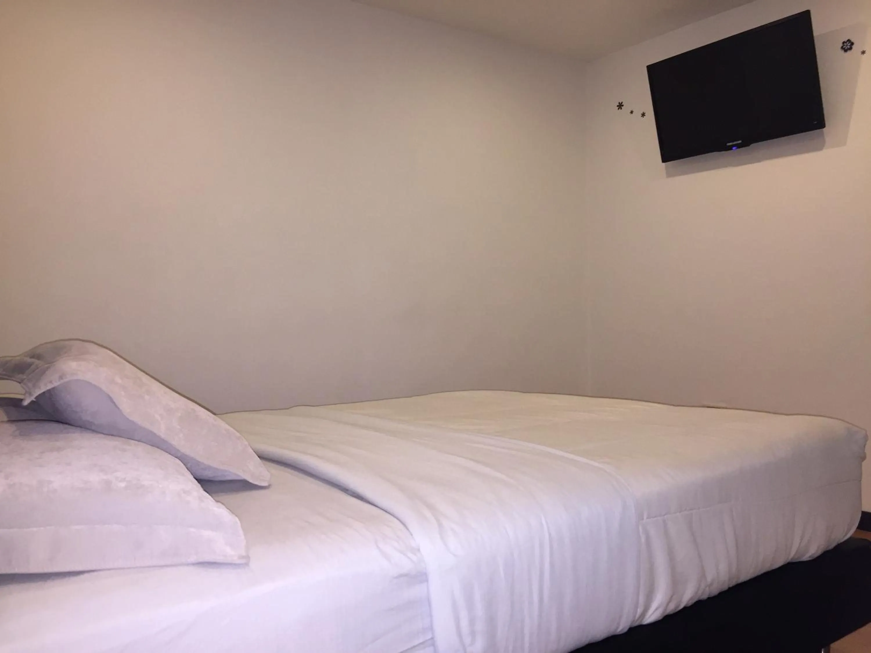 Bed in Hotel Montecarlo Boutique