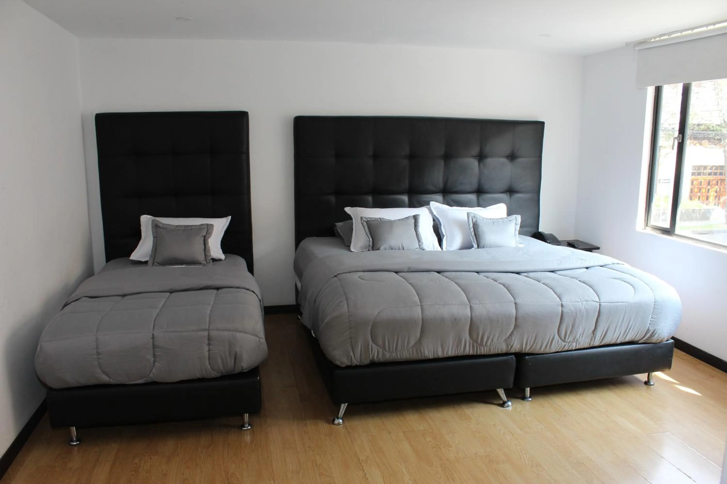 Bed in Hotel Montecarlo Boutique