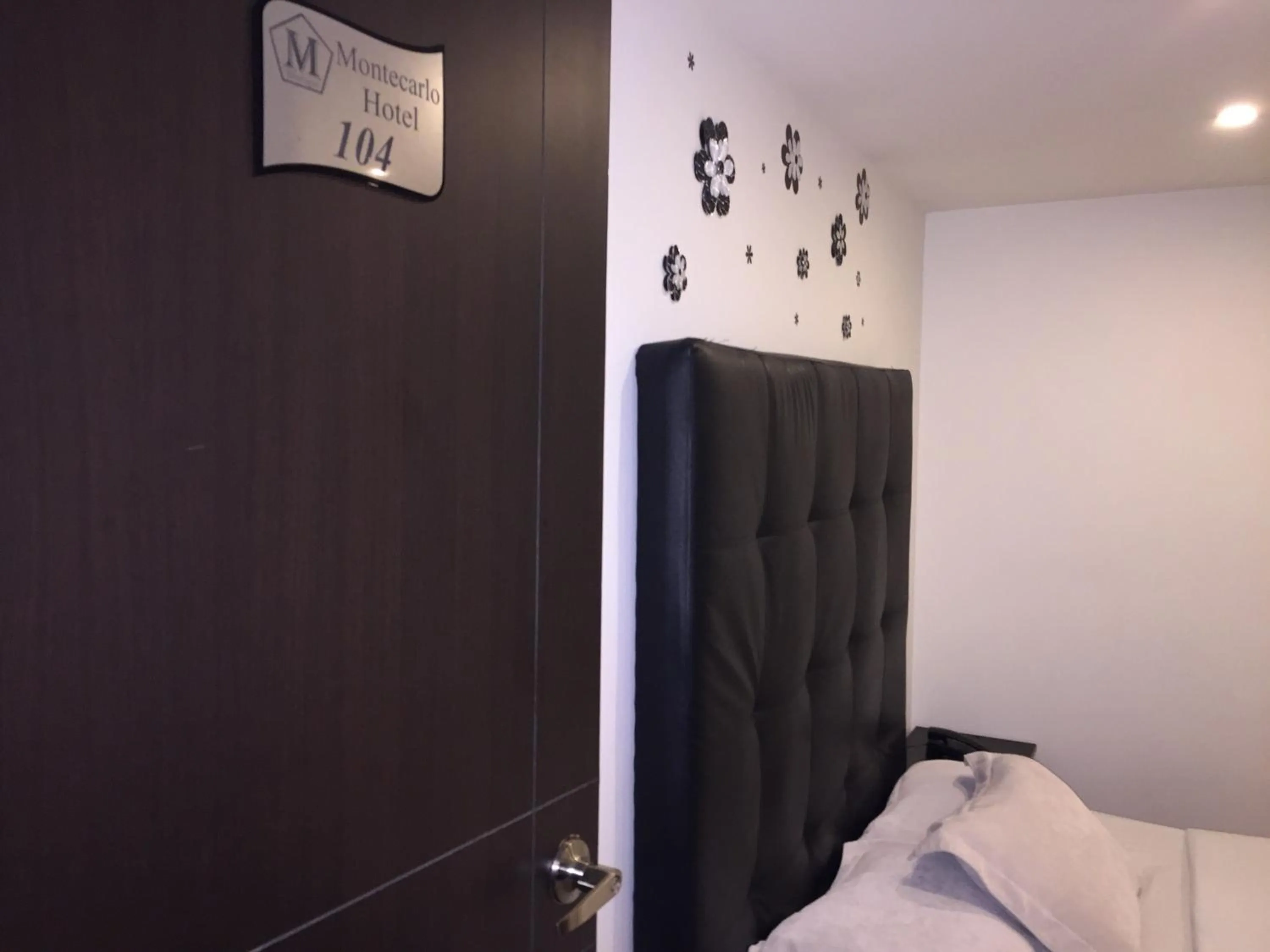 Bed in Hotel Montecarlo Boutique