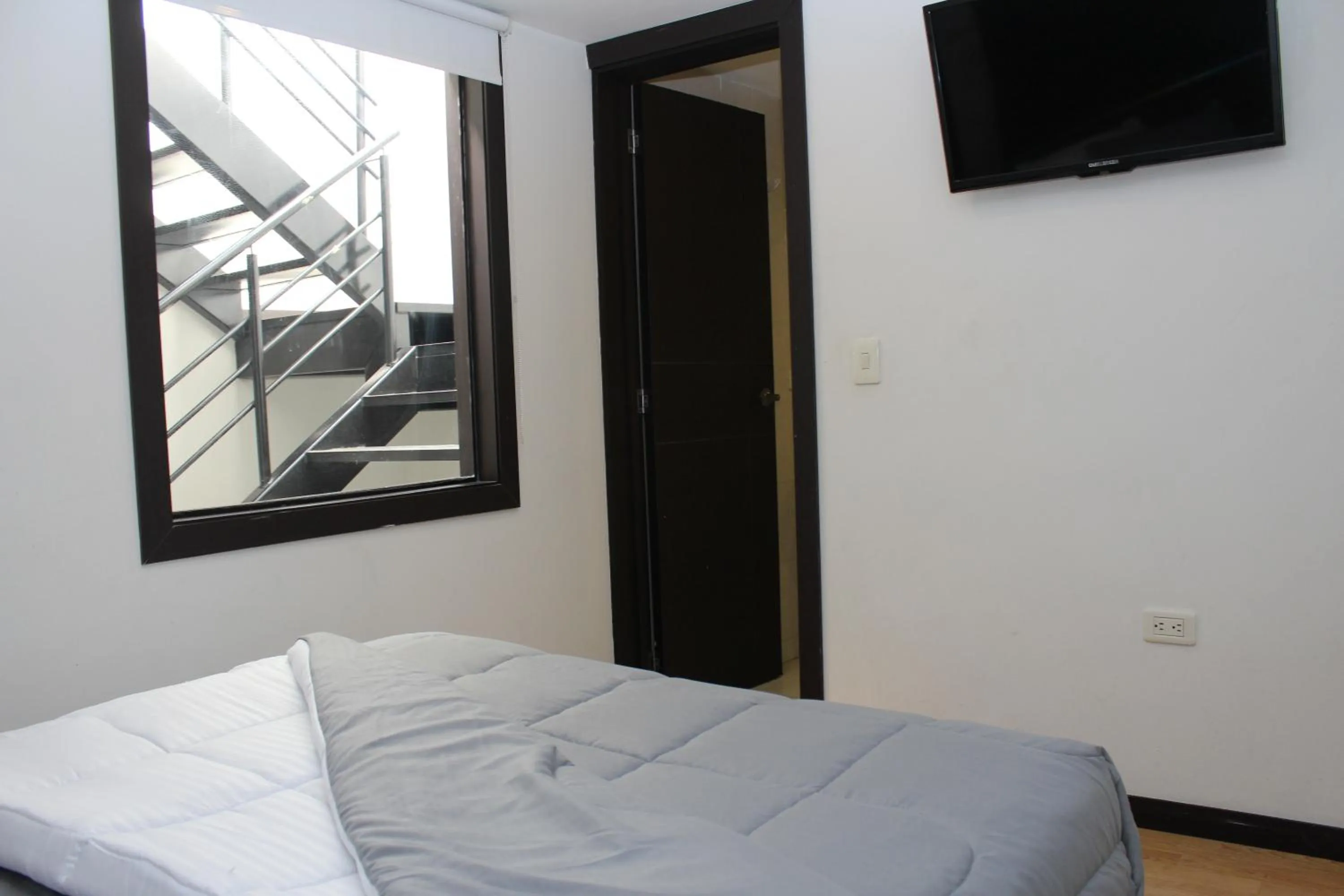 Bed in Hotel Montecarlo Boutique