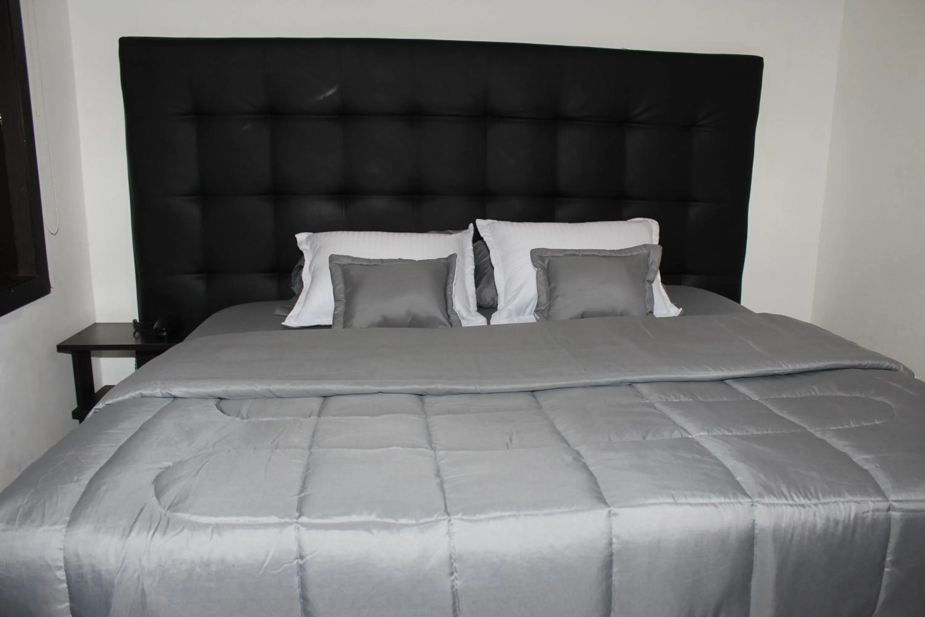Bed in Hotel Montecarlo Boutique