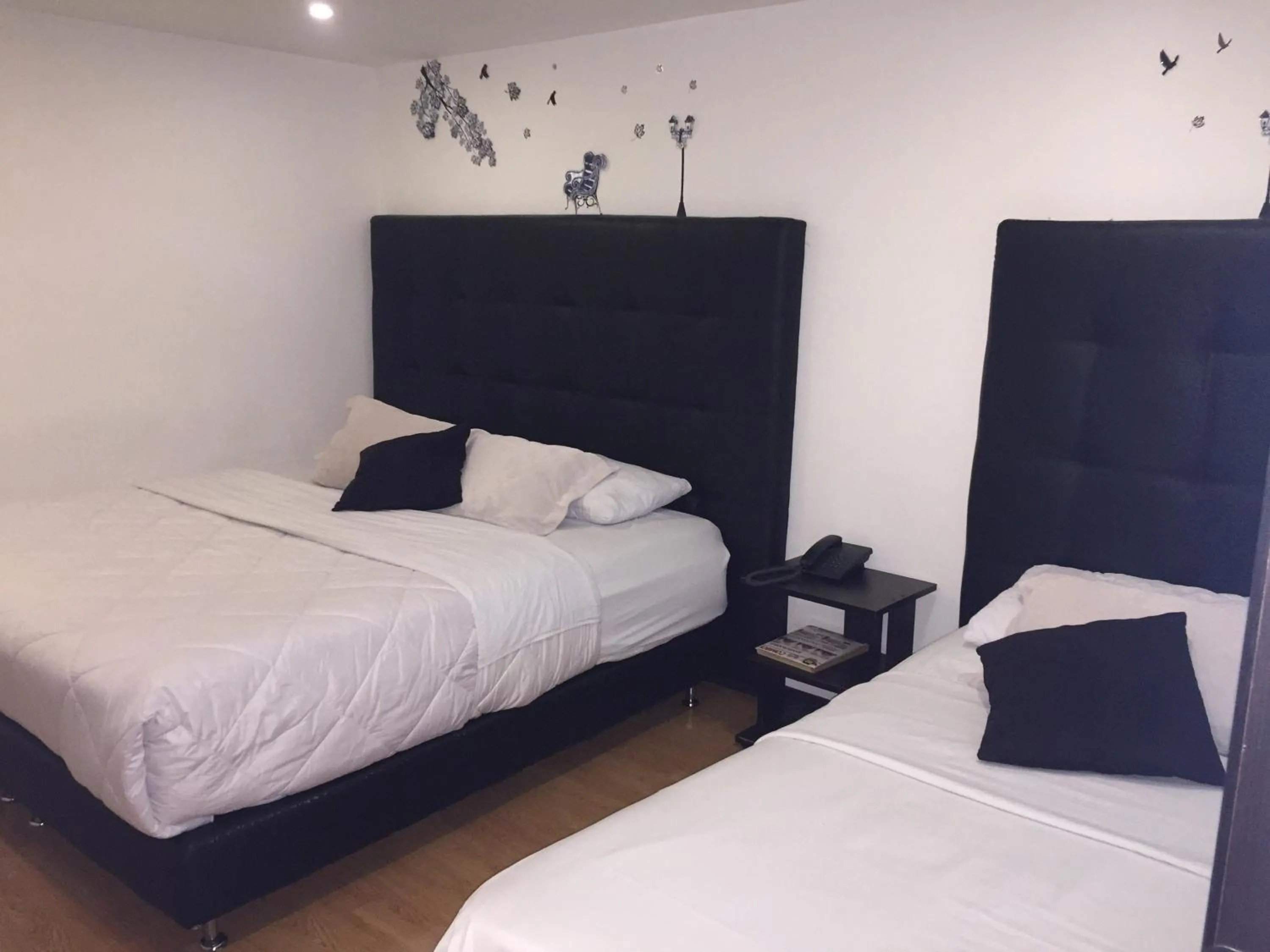 Bed in Hotel Montecarlo Boutique