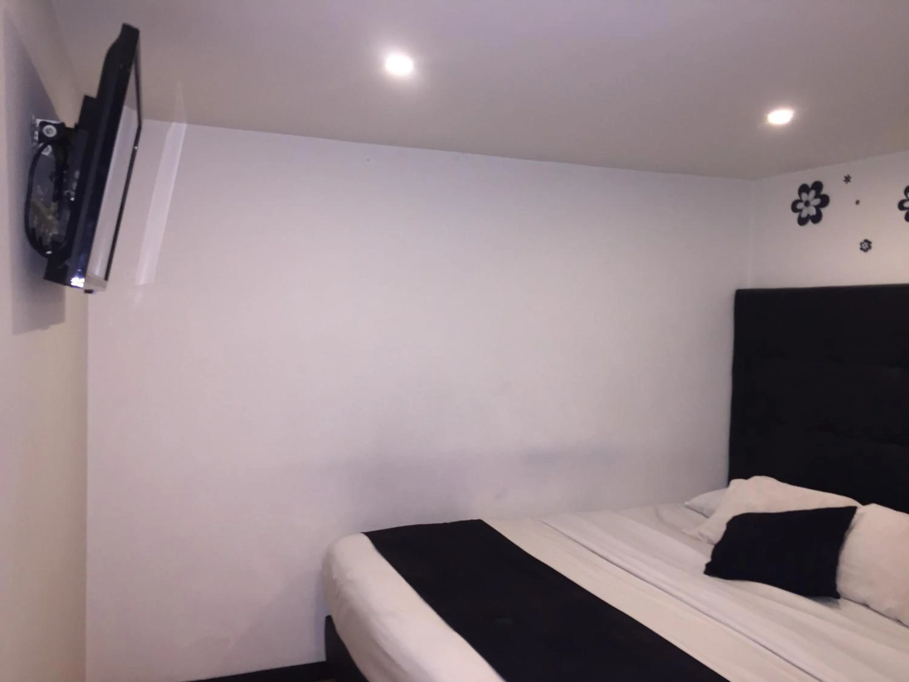 Bed in Hotel Montecarlo Boutique