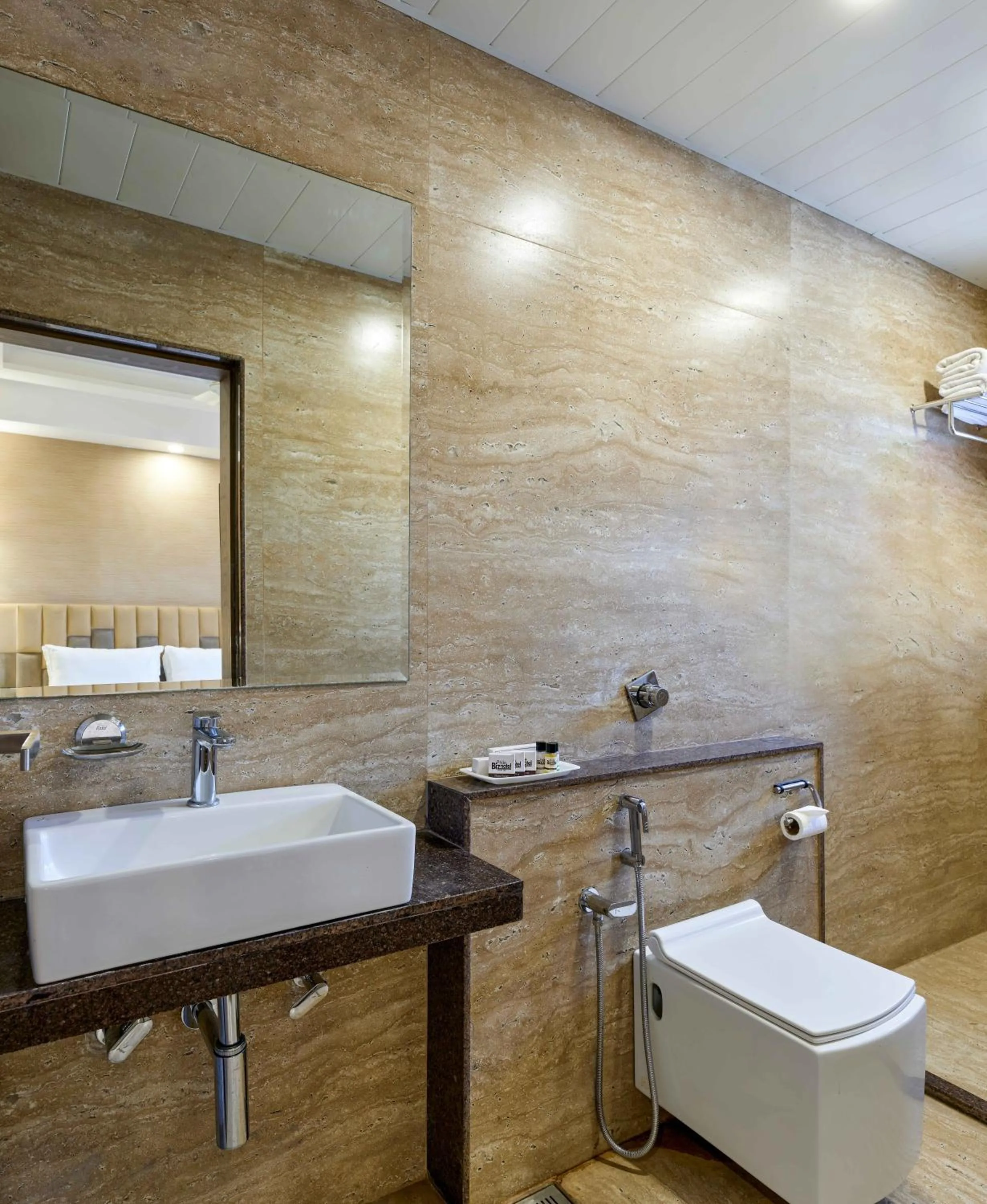 Bathroom in Pride Biznotel Sasan Gir