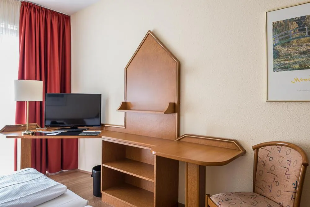 Photo of the whole room, Bed in Hotel Residenz Limburgerhof