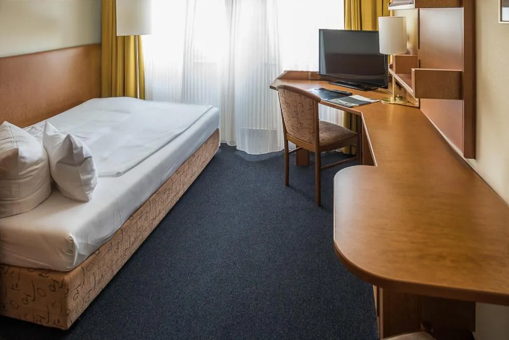 Photo of the whole room, Bed in Hotel Residenz Limburgerhof