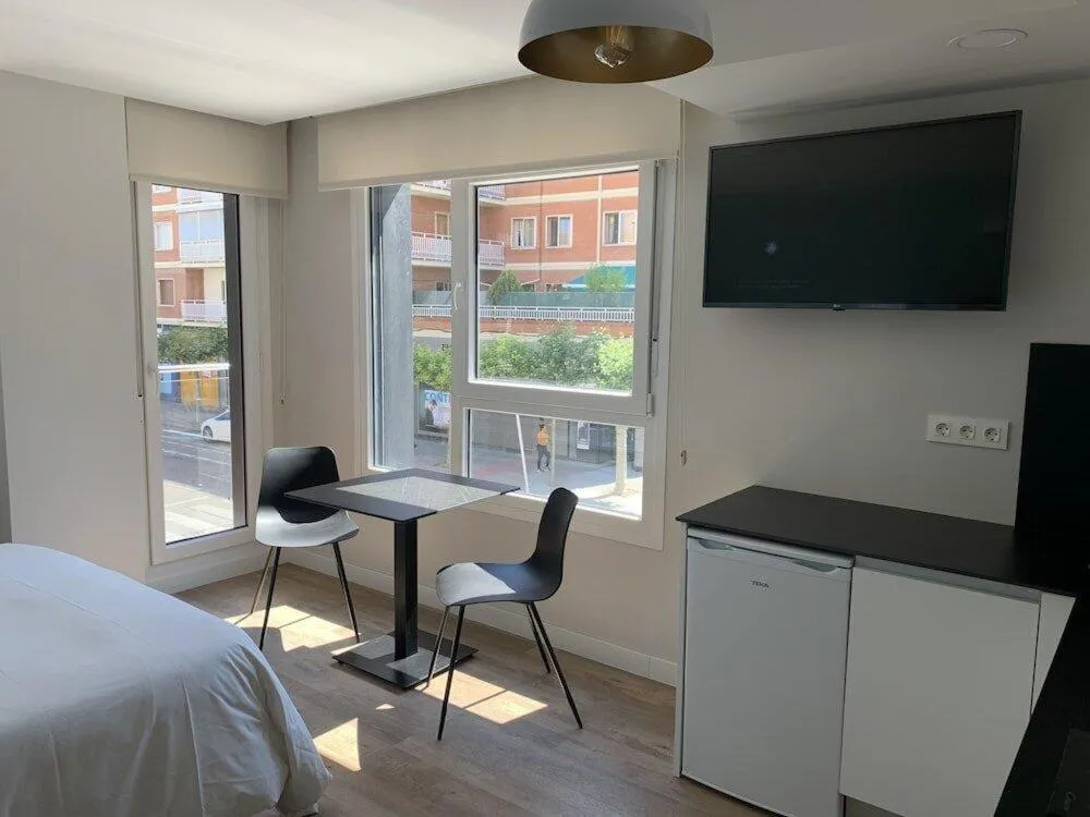 Dining area, Bed in Apartahotel Aranda Flex Living