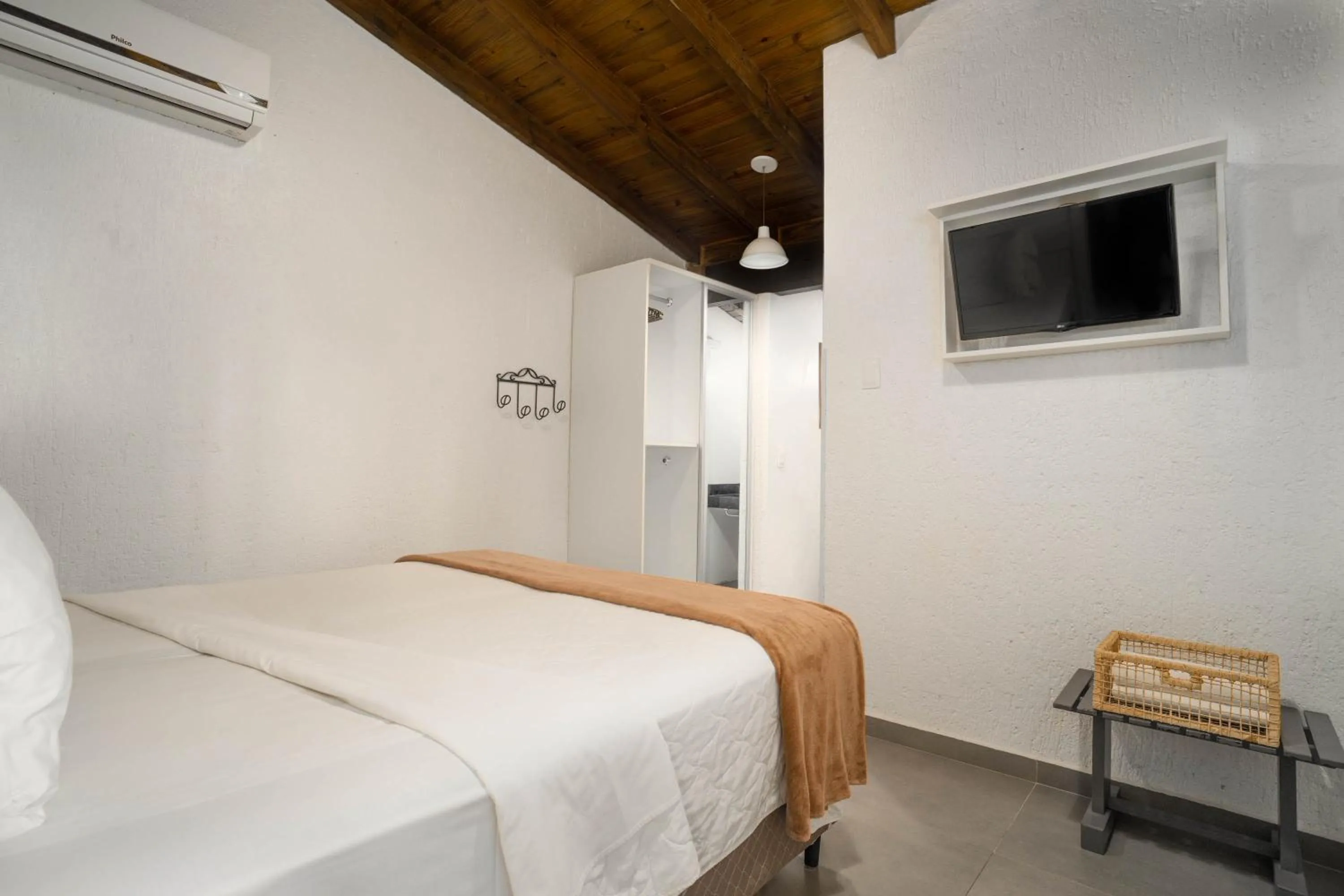 Bed in Bossa Jurerê Hotel