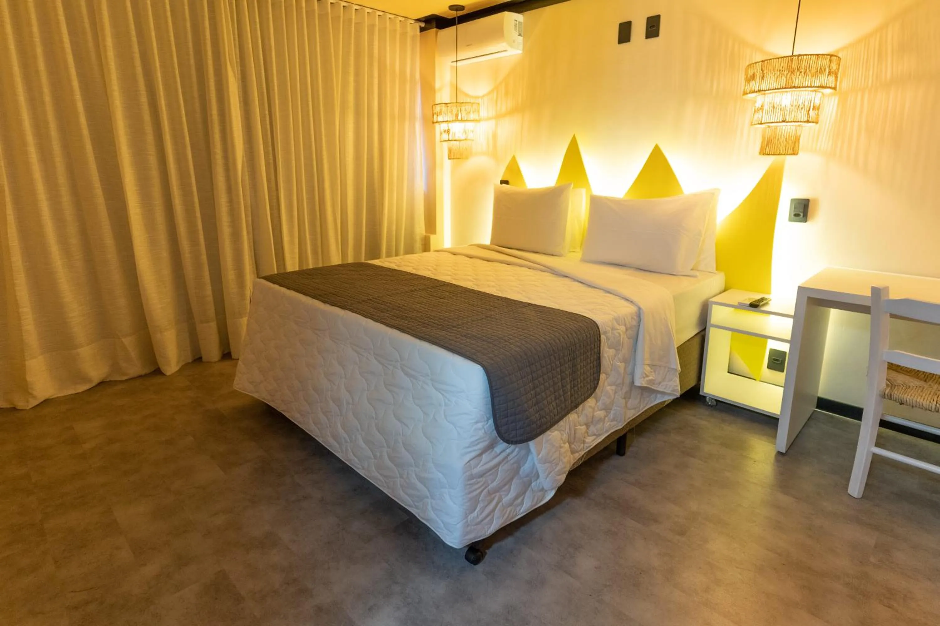 Bed in Bossa Jurerê Hotel