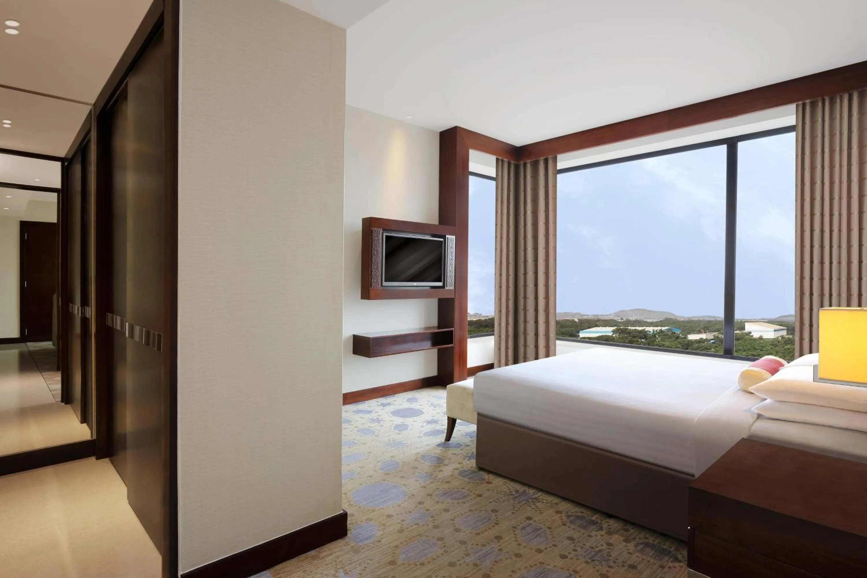 Photo of the whole room, Bed in Courtyard by Marriott Pune Chakan