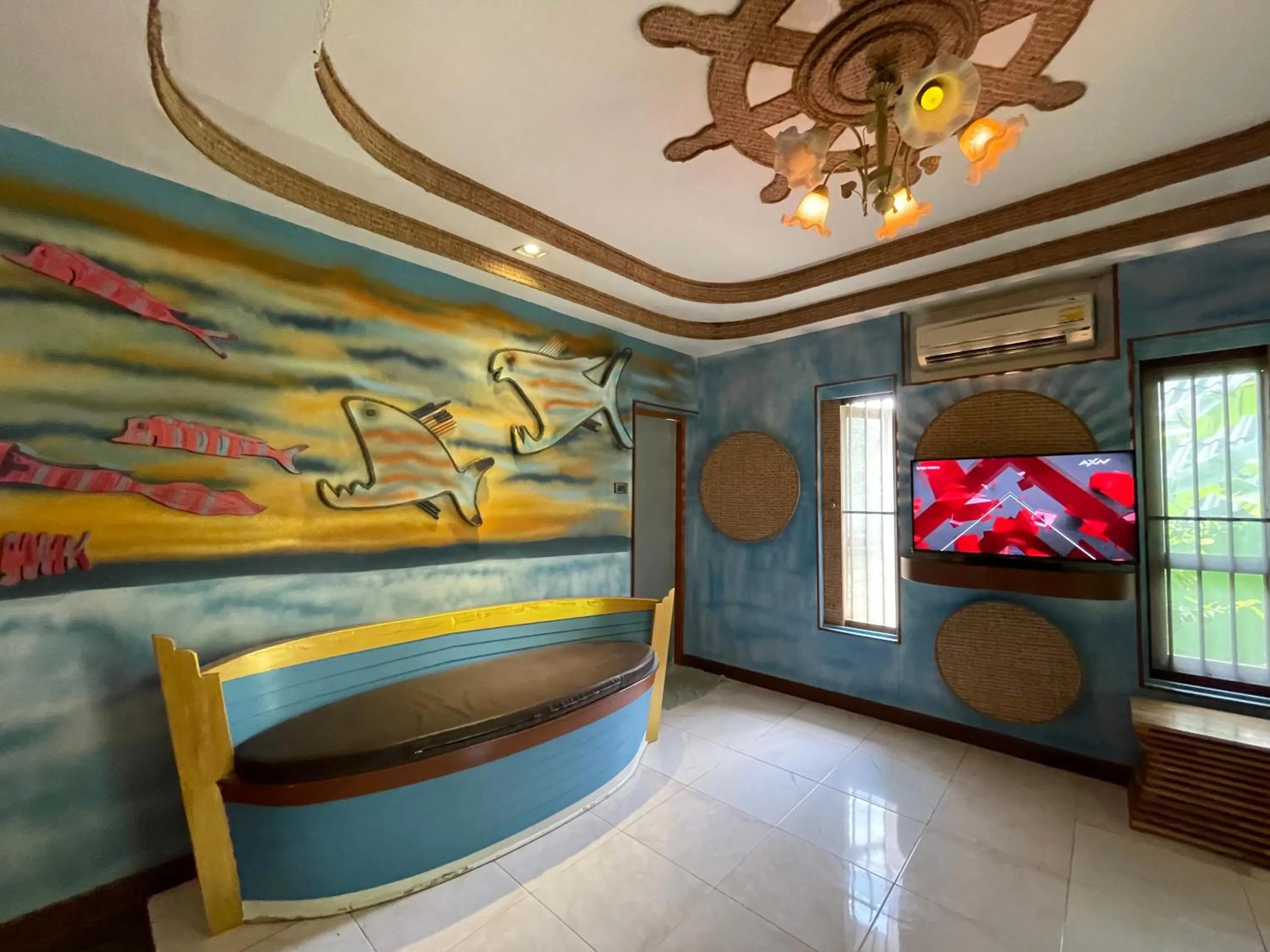 Living room, Bed in AC 2 Resort