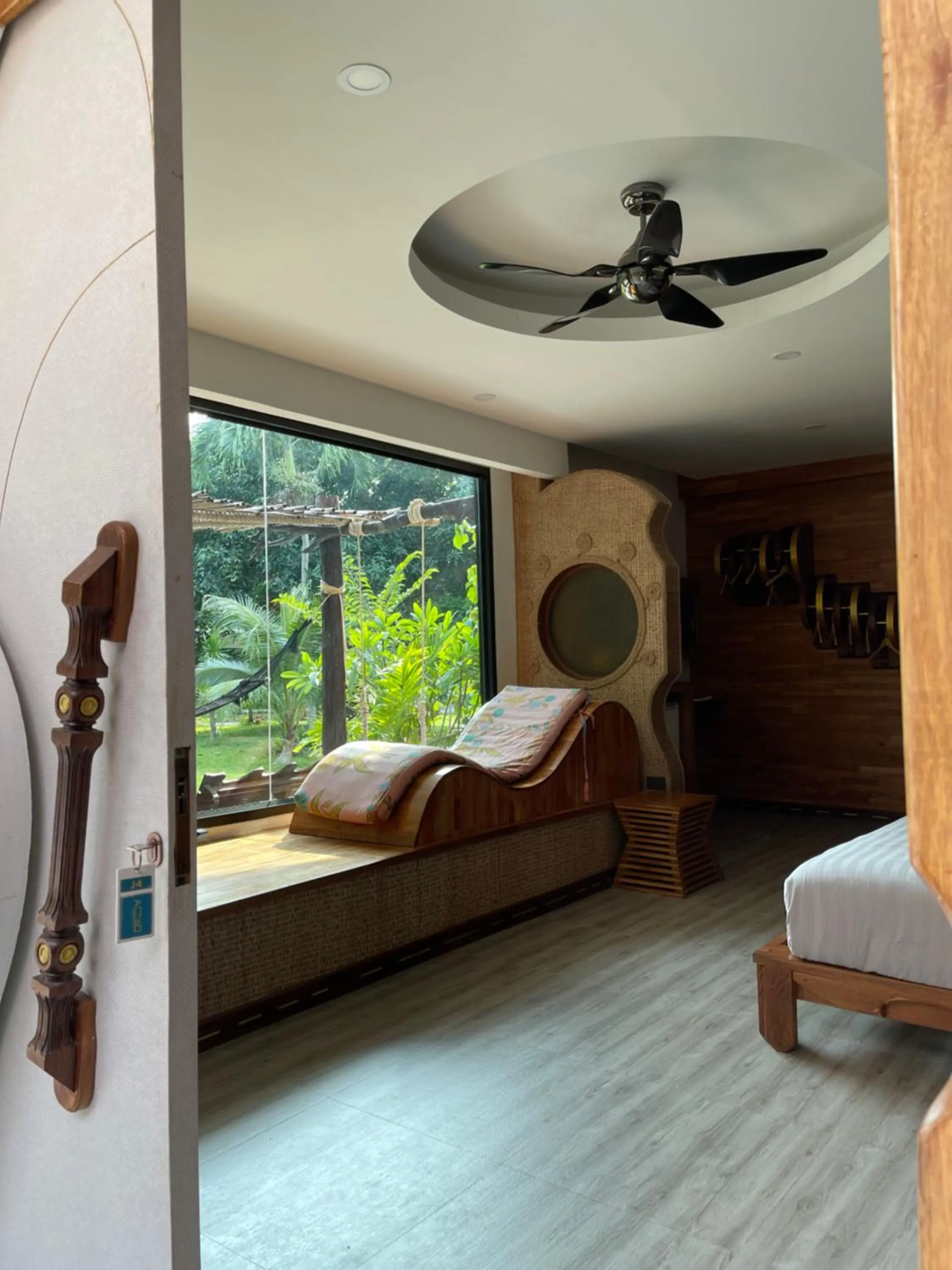 Seating area, Bed in AC 2 Resort