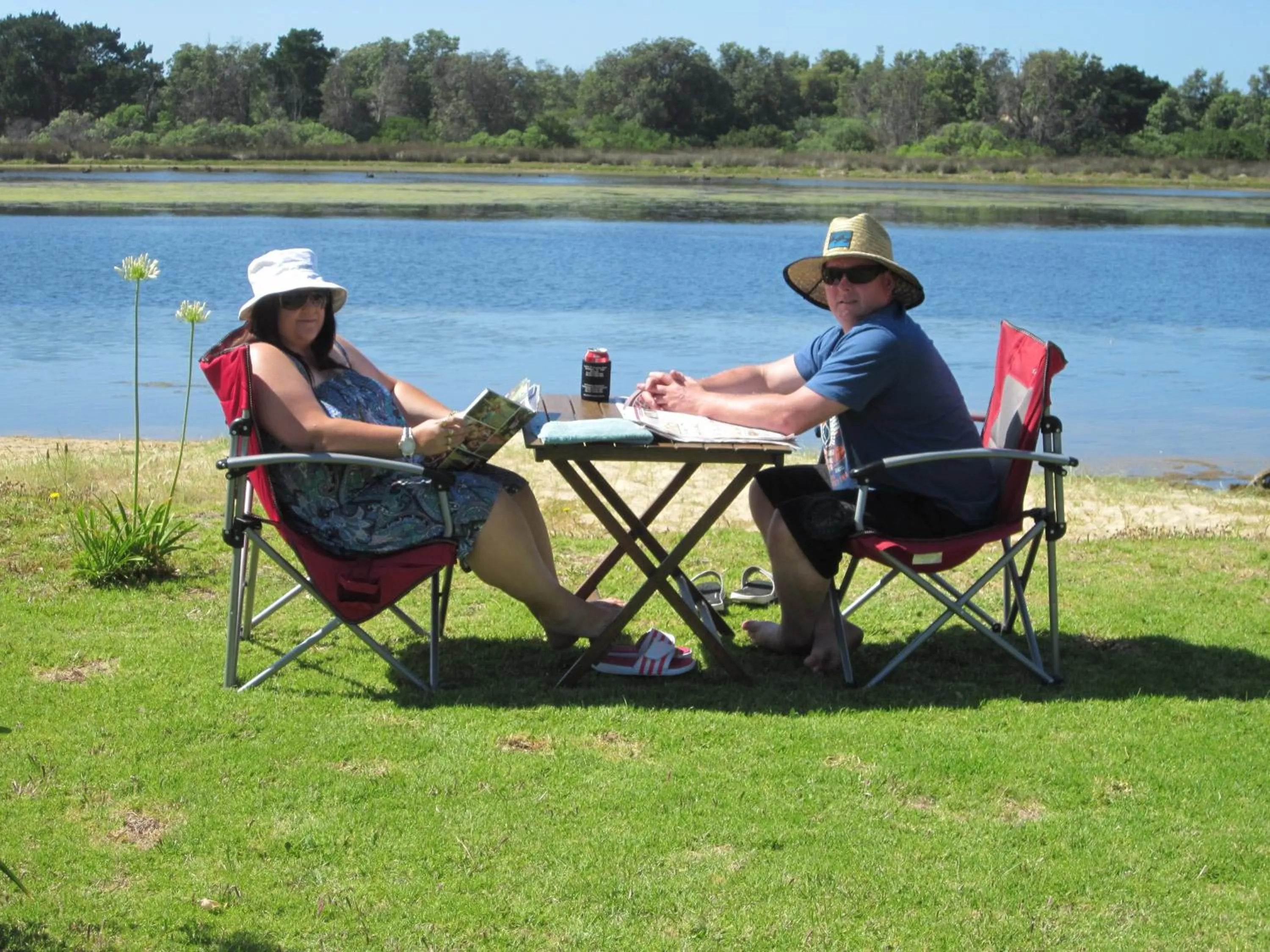 People in Lakes Entrance Waterfront Cottages with King Beds