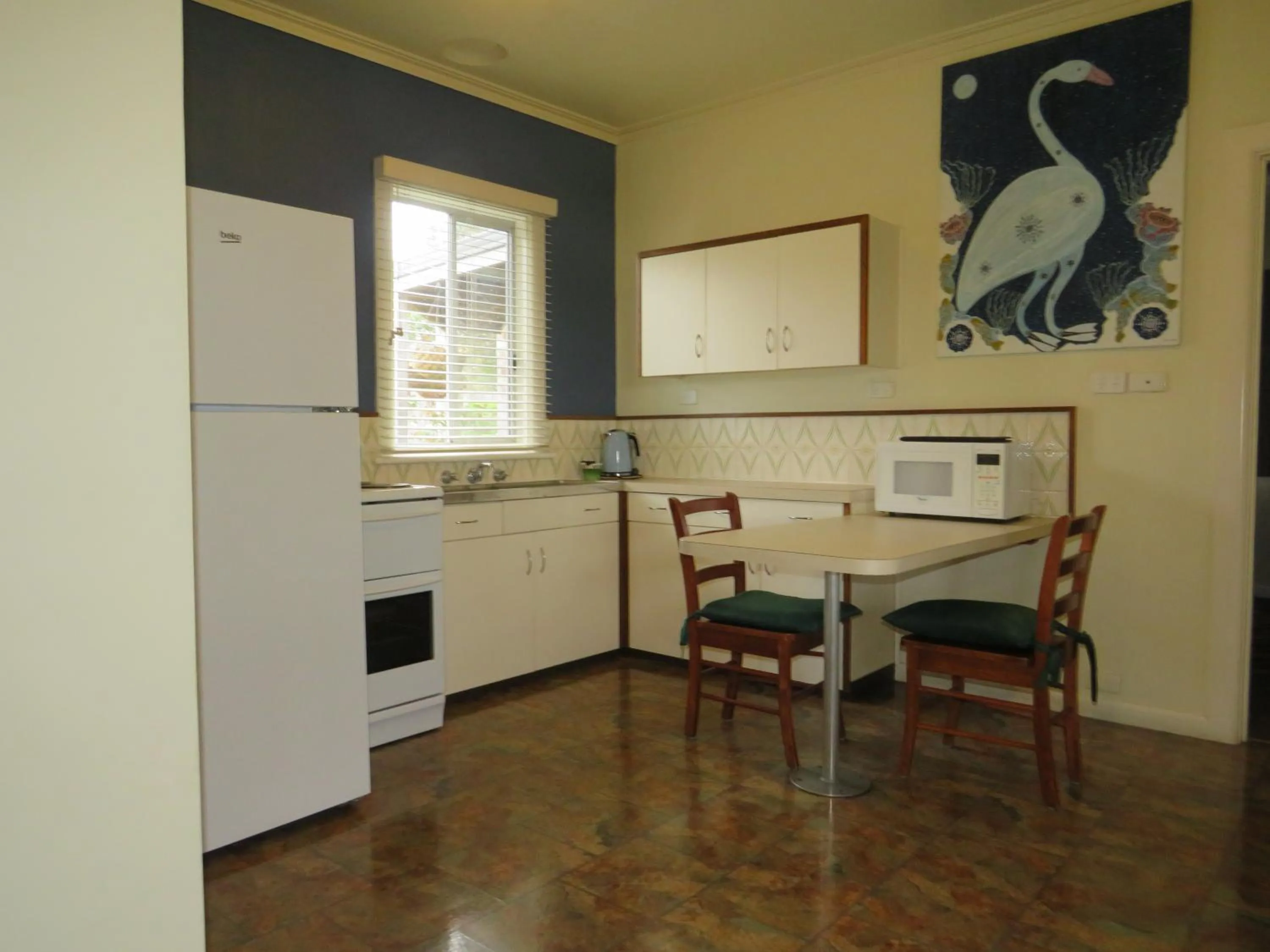 Property building in Lakes Entrance Waterfront Cottages with King Beds