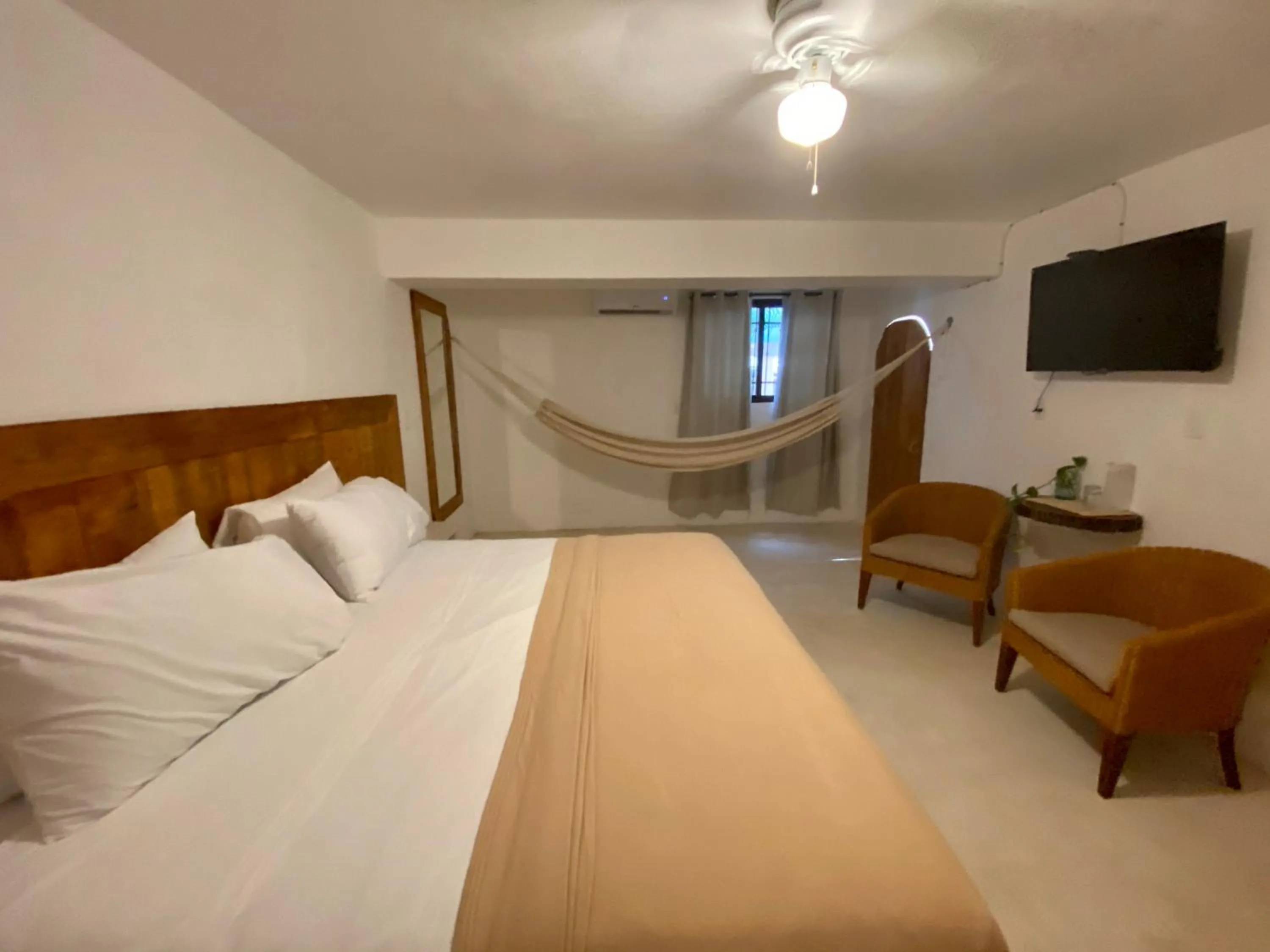 TV and multimedia, Bed in MIO Cancún Hotel Boutique
