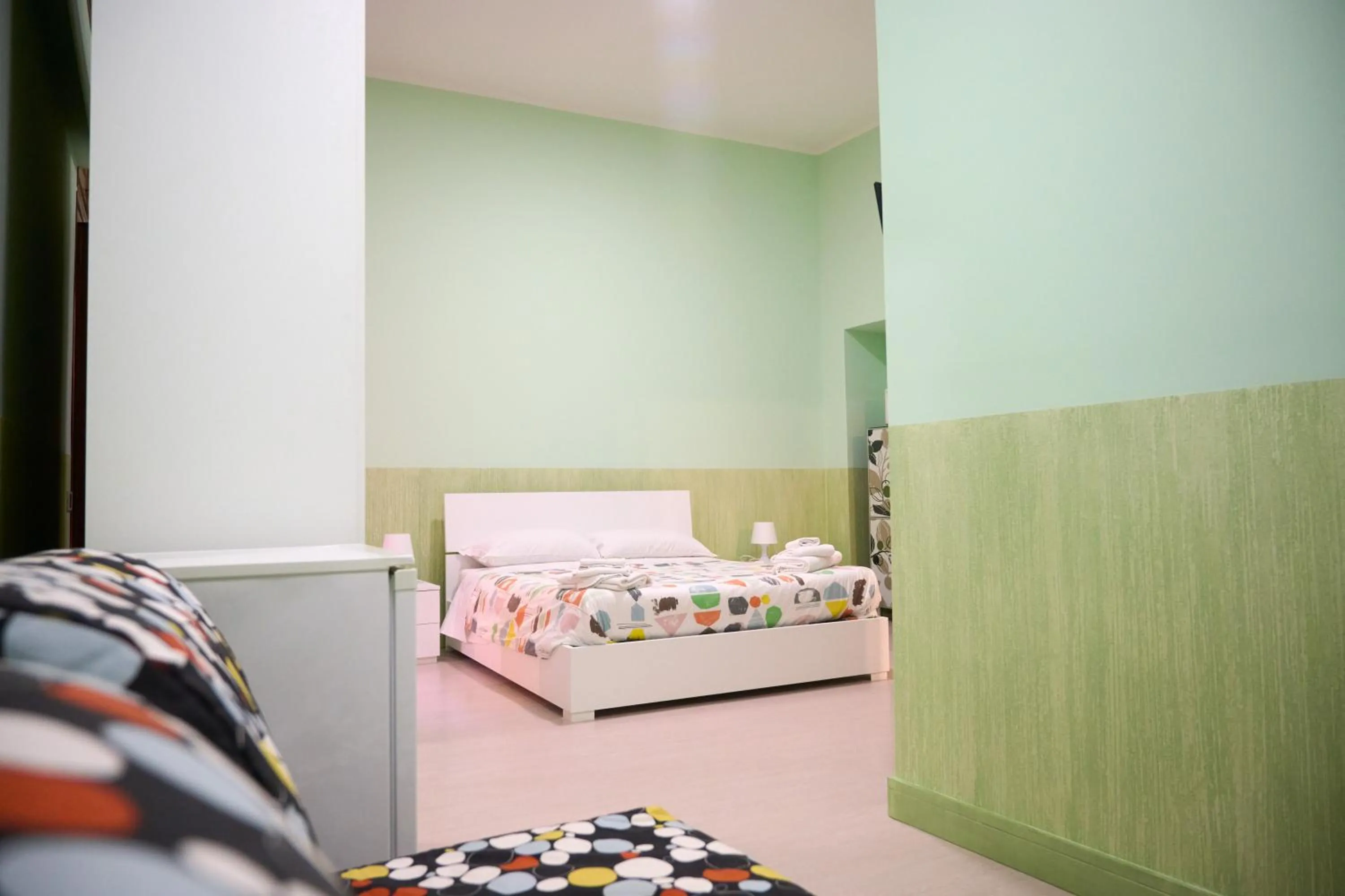 Bedroom, Bed in On The Rainbow B&B