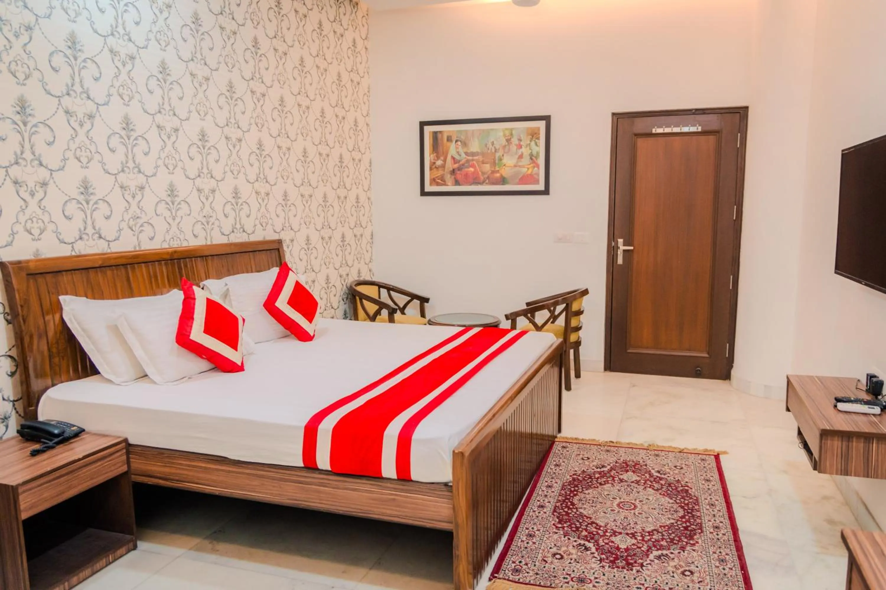 Bed in Peepal Tree Residency