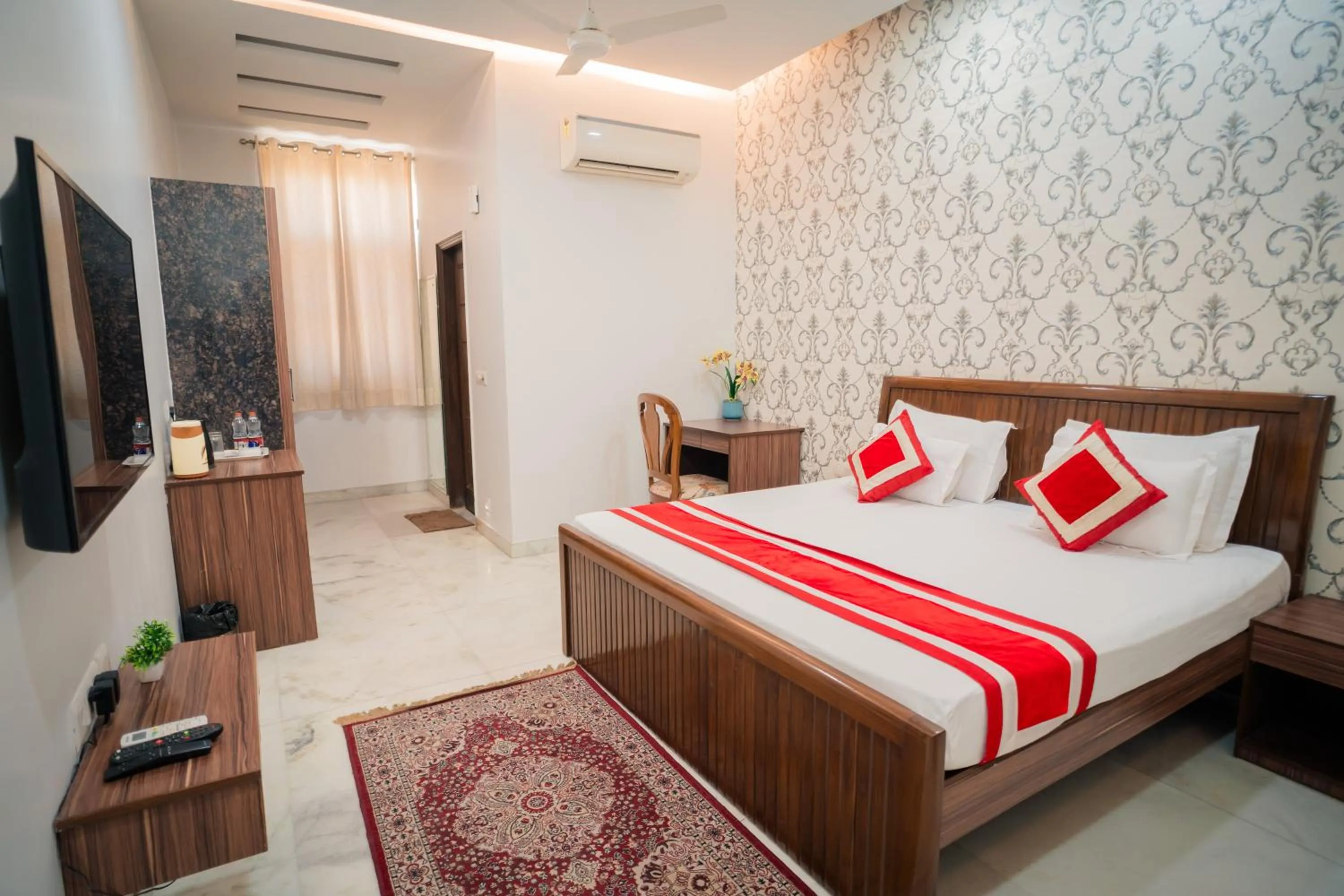 Bed in Peepal Tree Residency