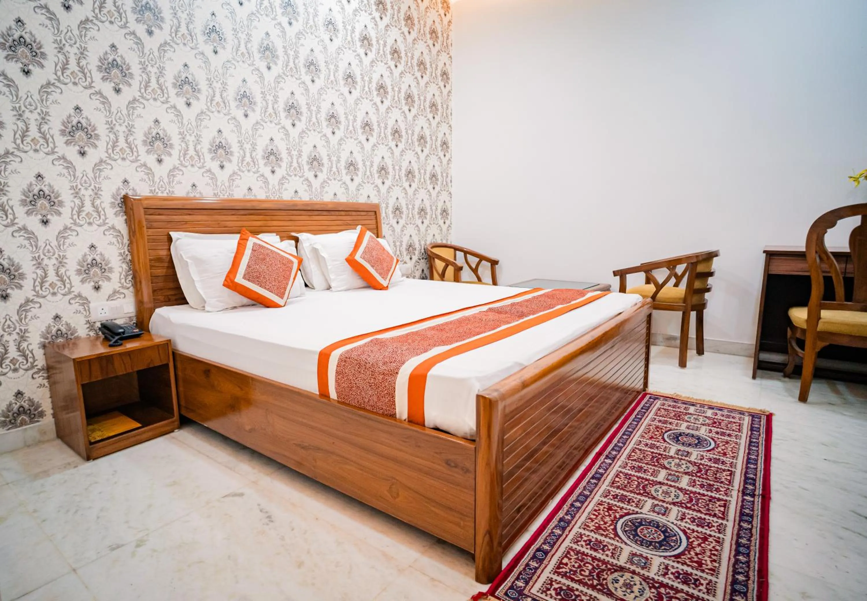 Bed in Peepal Tree Residency