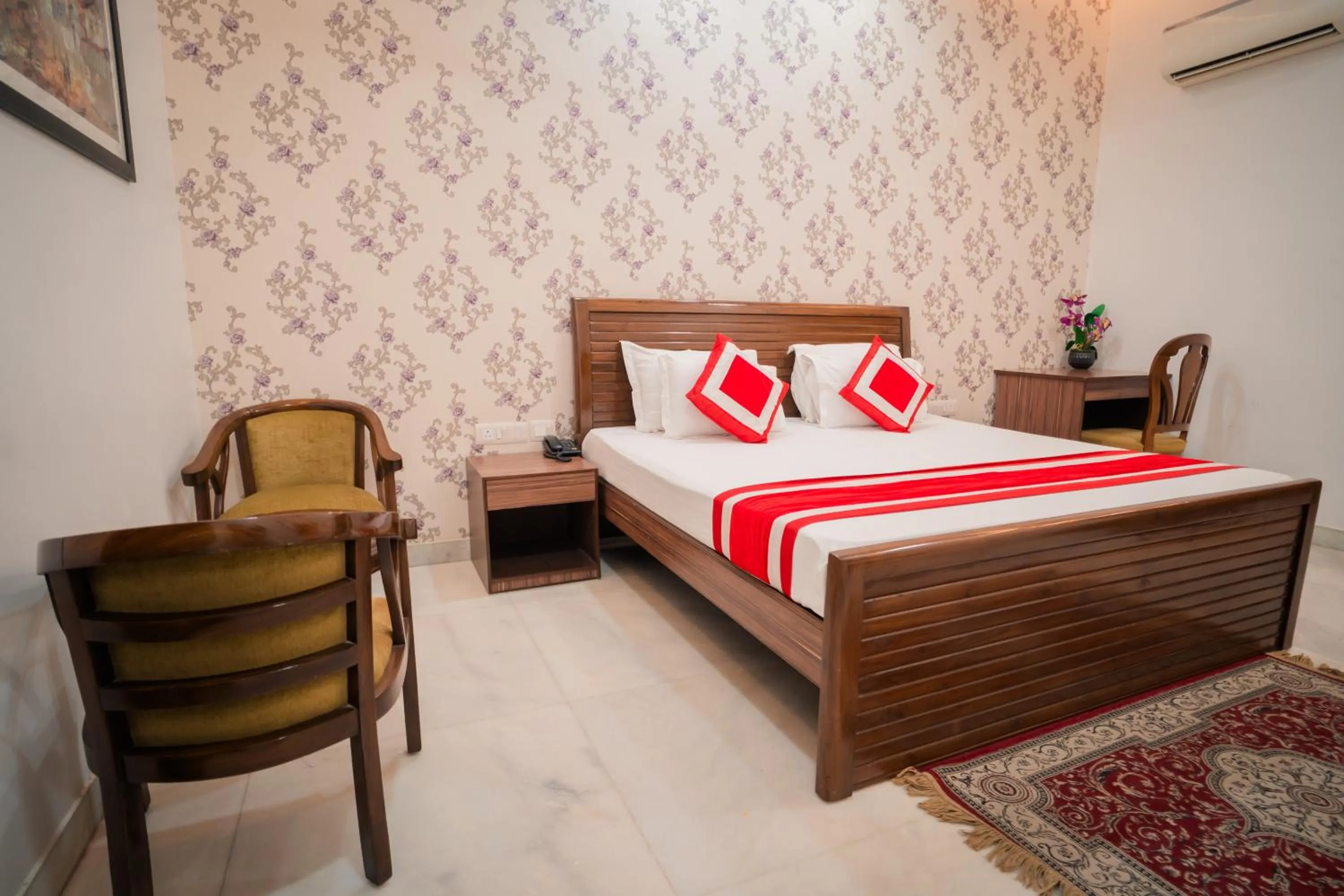 Bed in Peepal Tree Residency
