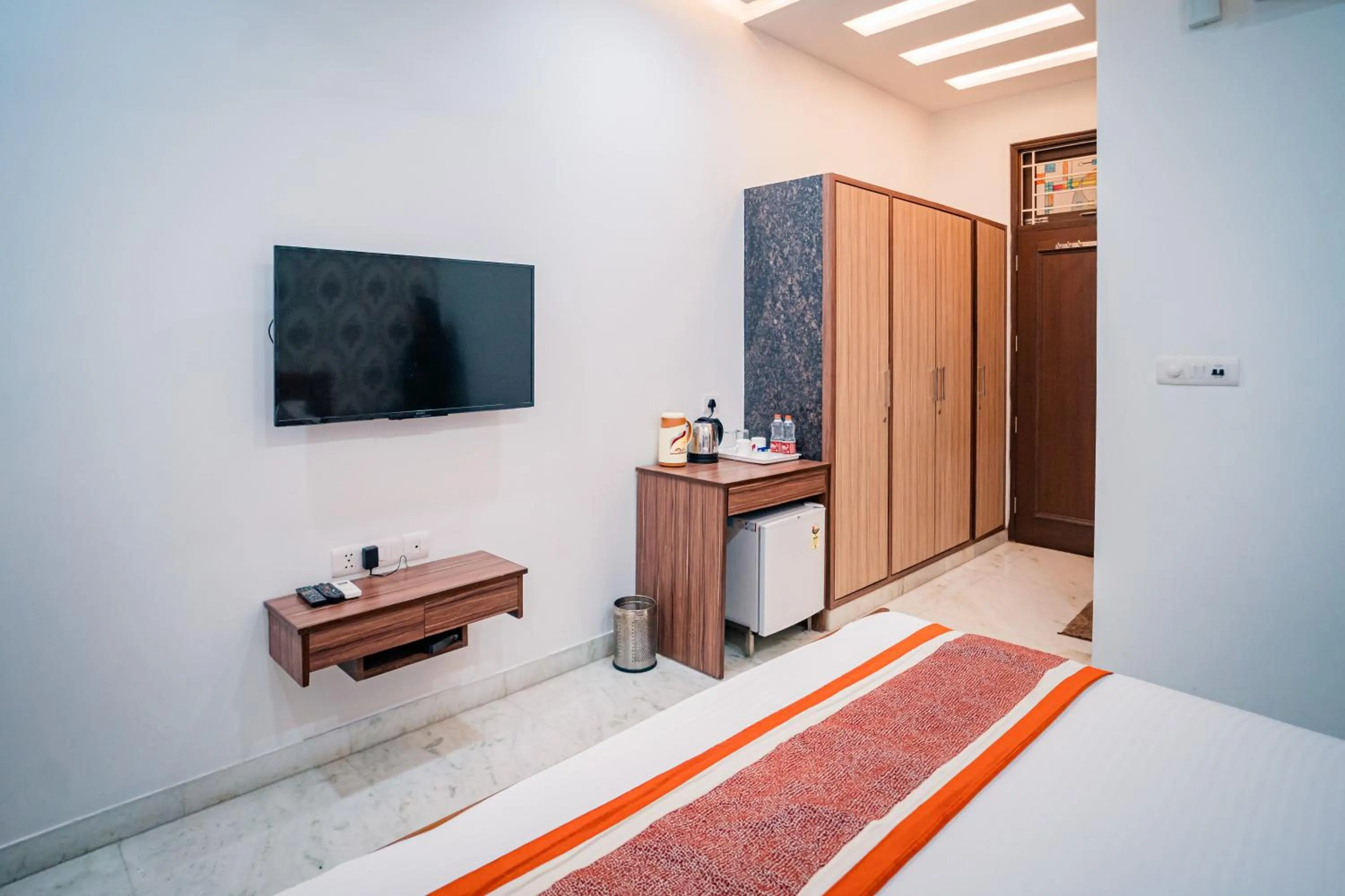 Bed in Peepal Tree Residency