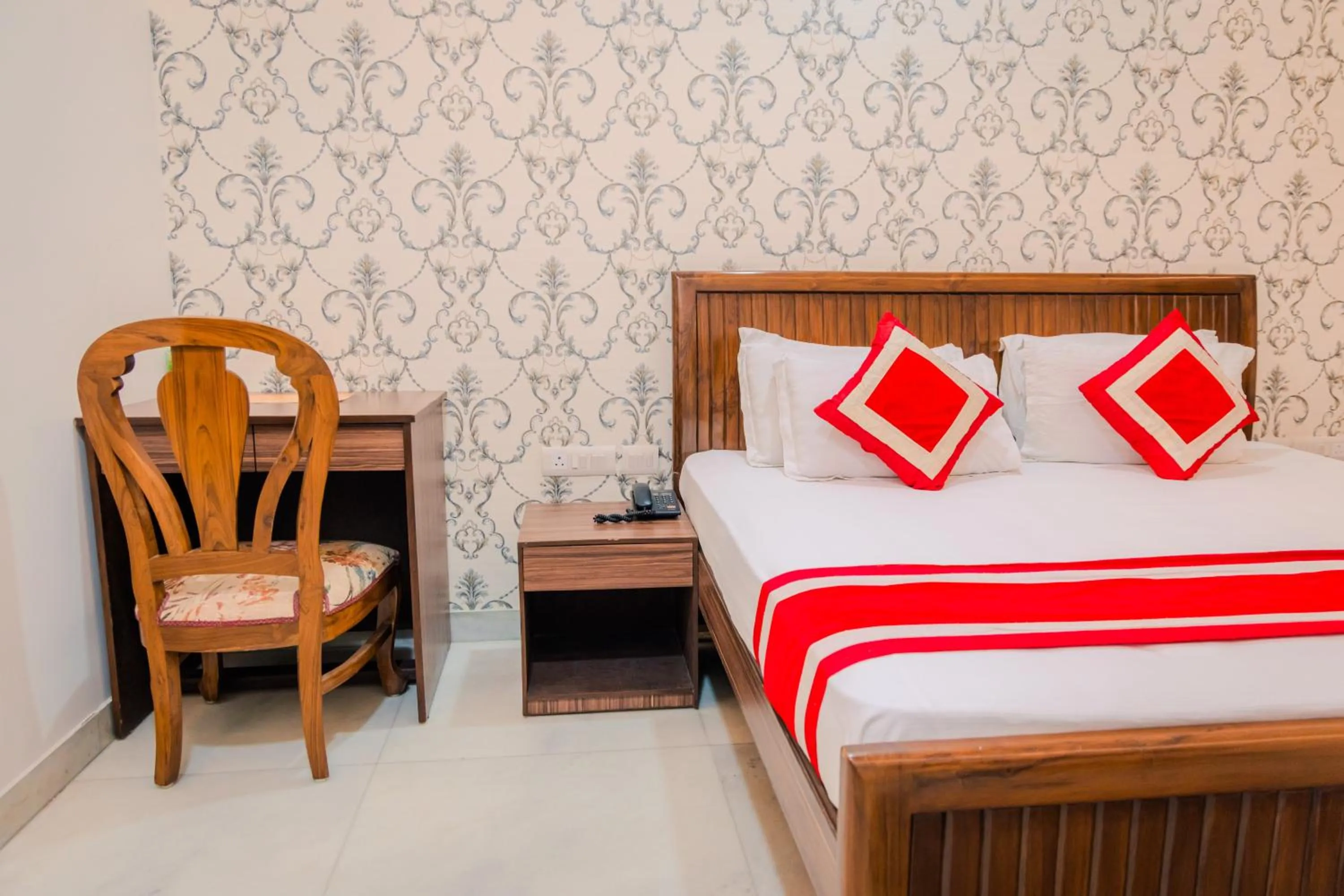 Bed in Peepal Tree Residency