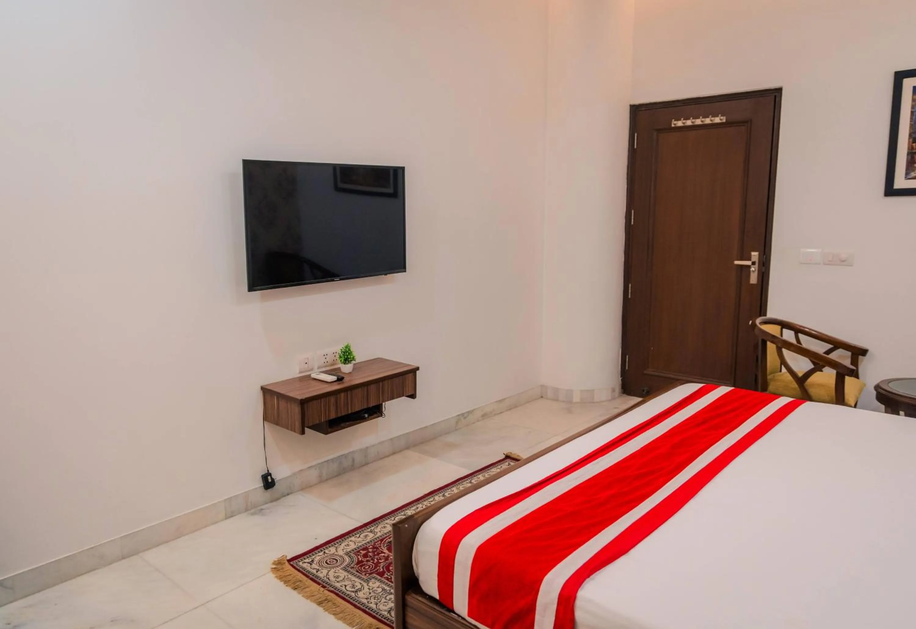 Bed in Peepal Tree Residency