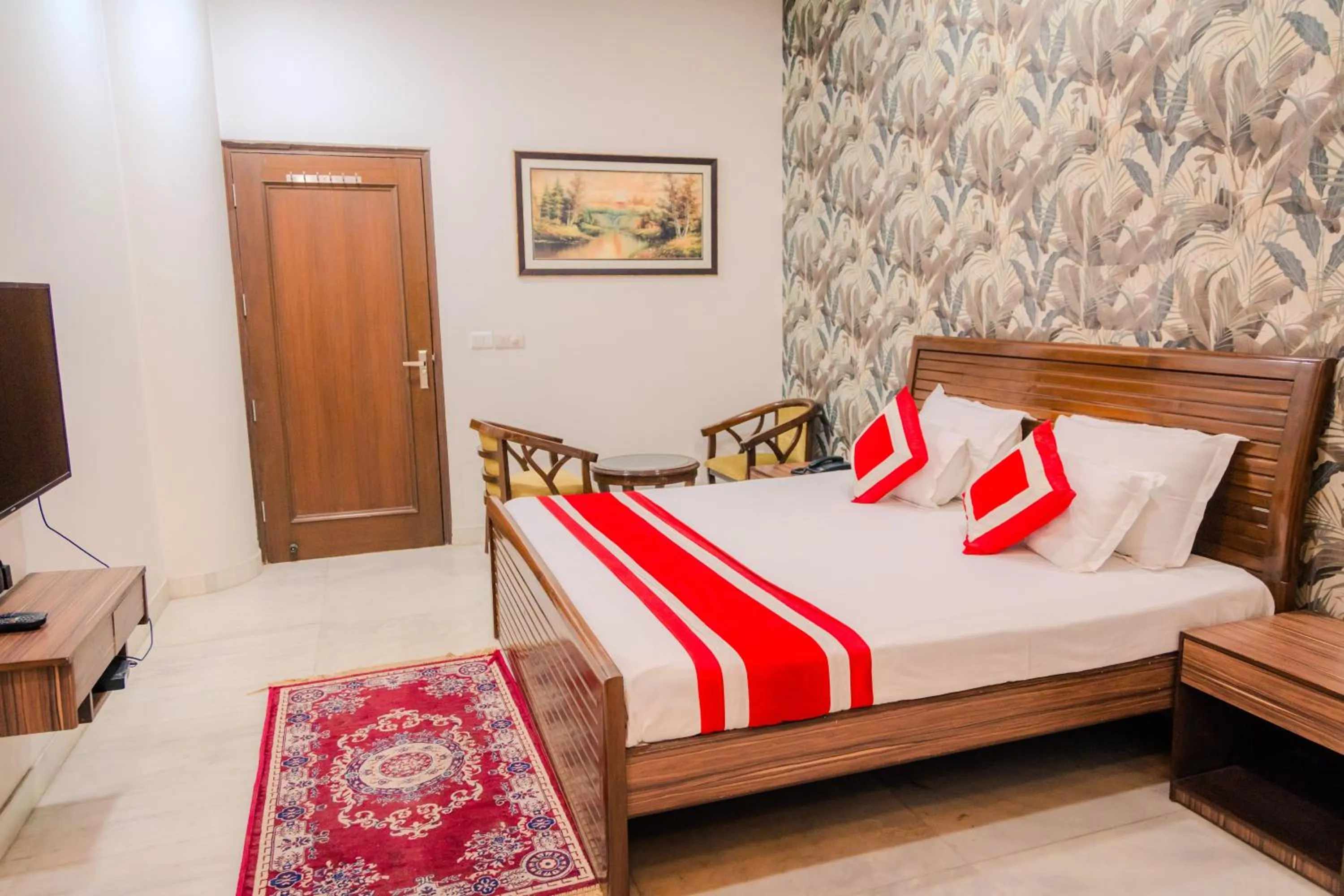 Bed in Peepal Tree Residency