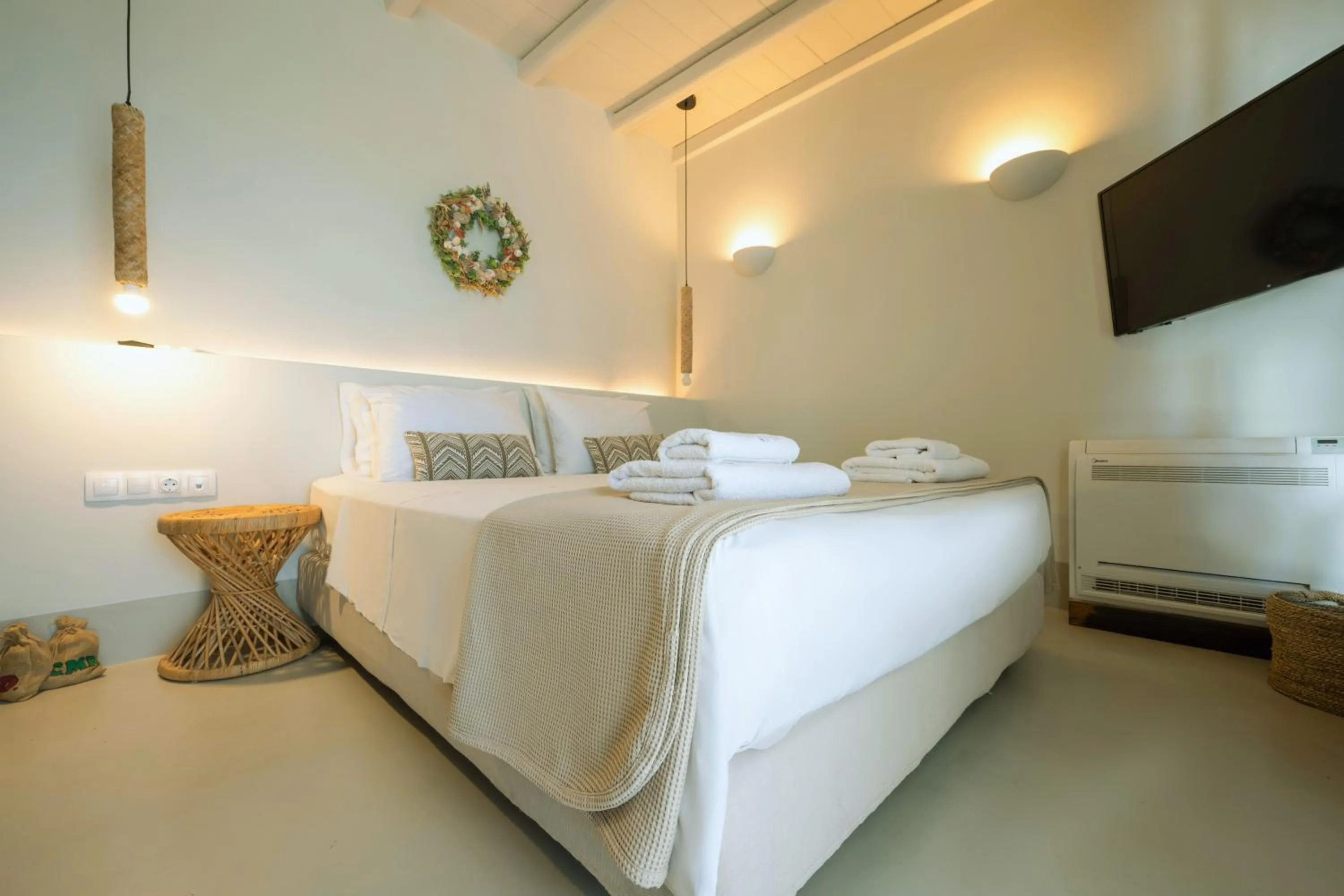 Bed in Aegean Hospitality