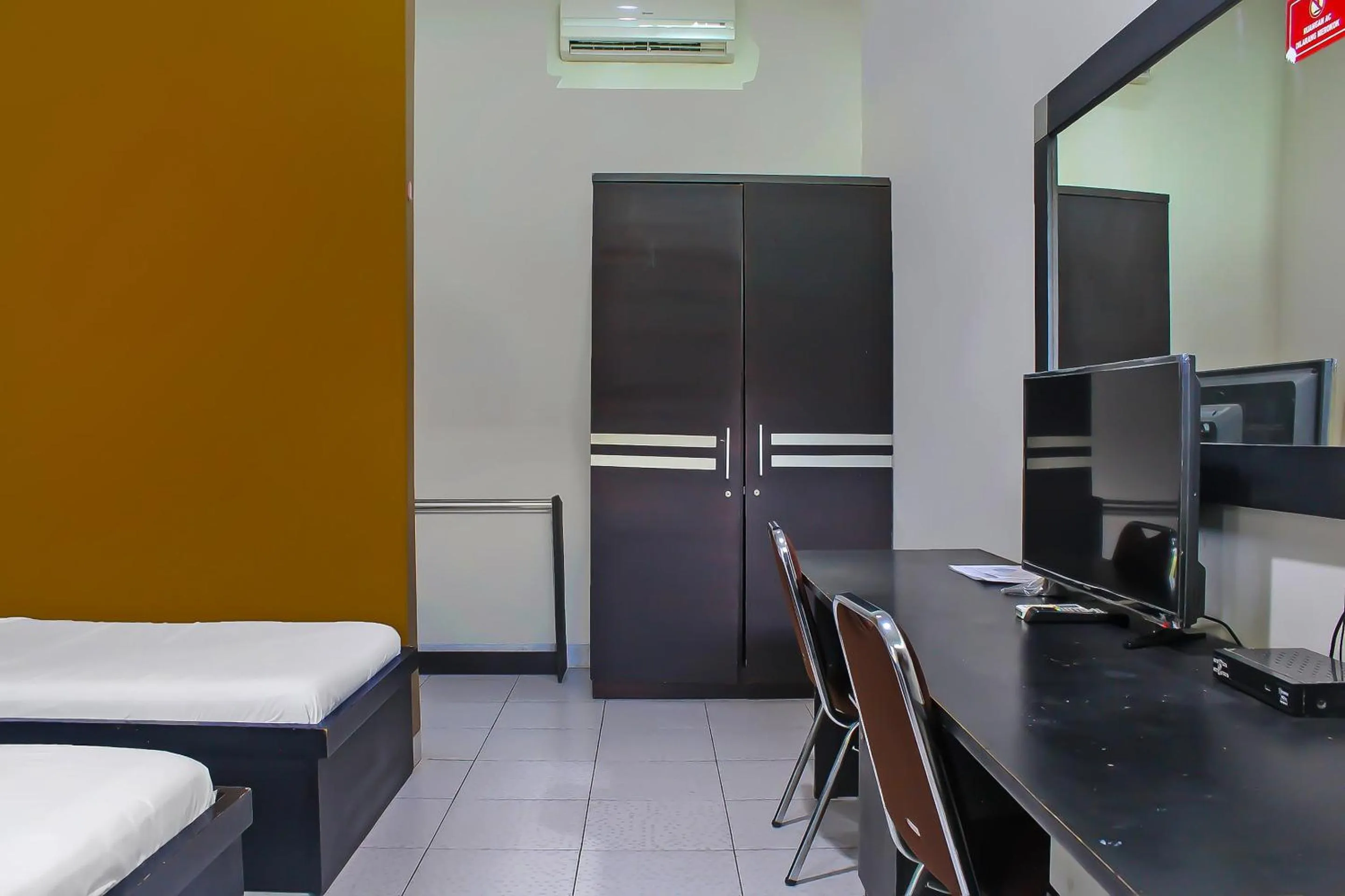 Bedroom in Collection O 92268 Hotel Aero