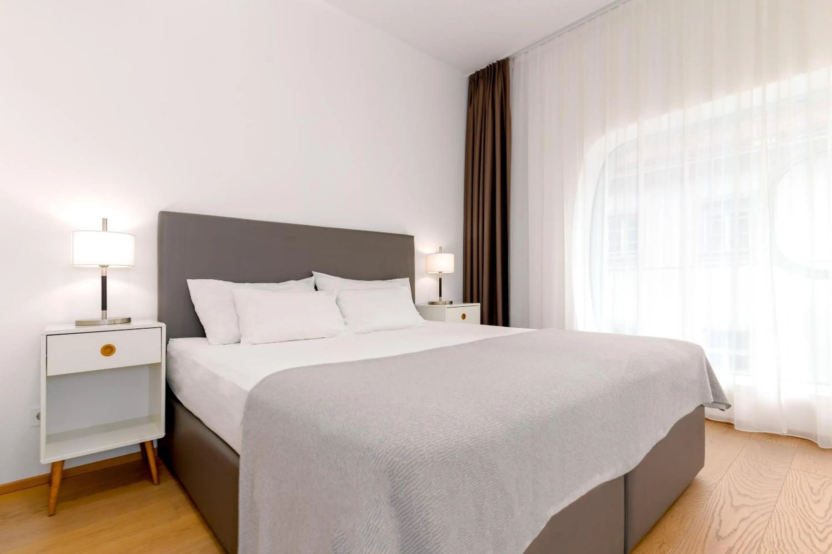 Bed in ARGOS Graz Serviced Apartments, kontaktlos mit Self Check-in