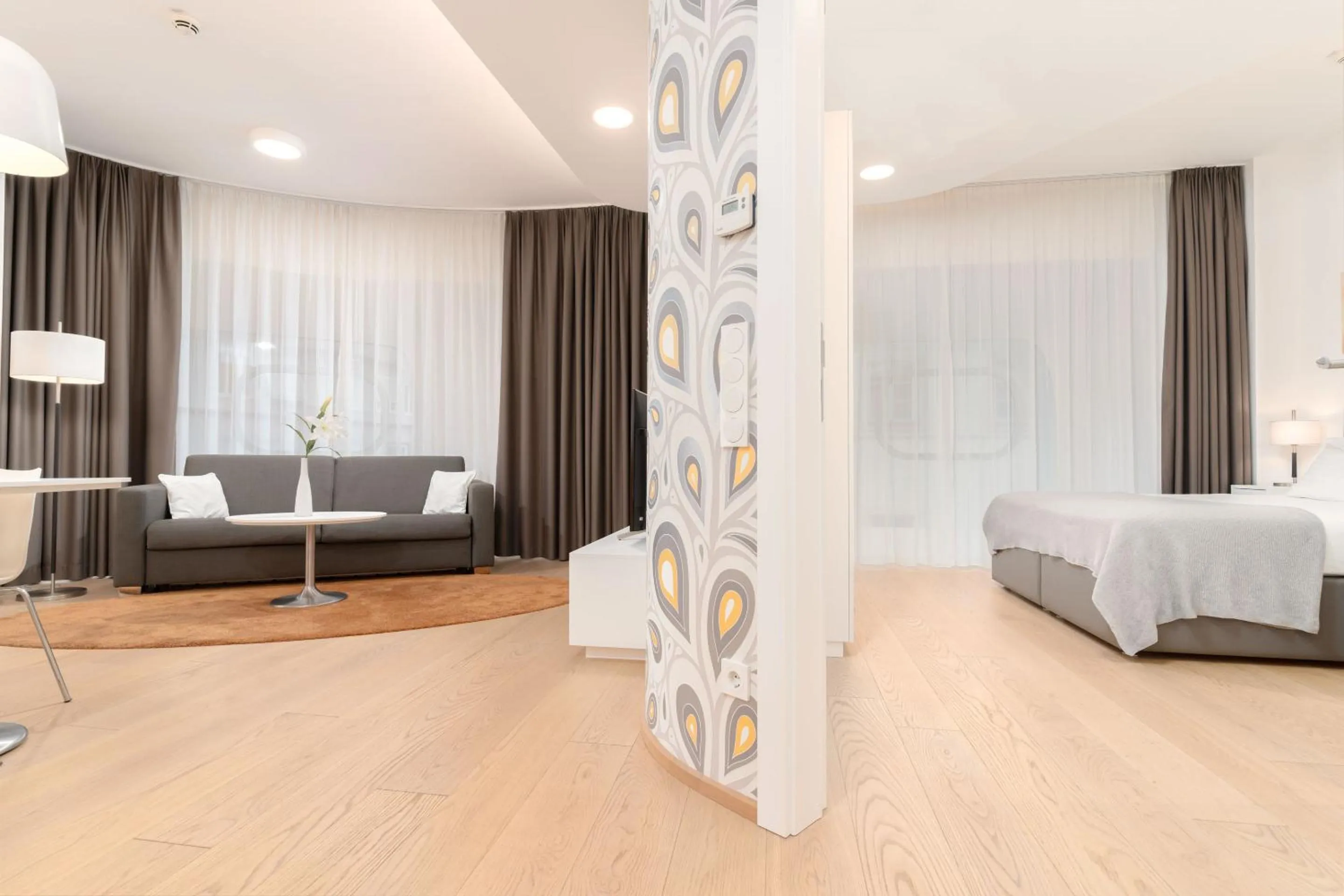 Bed in ARGOS Graz Serviced Apartments, kontaktlos mit Self Check-in