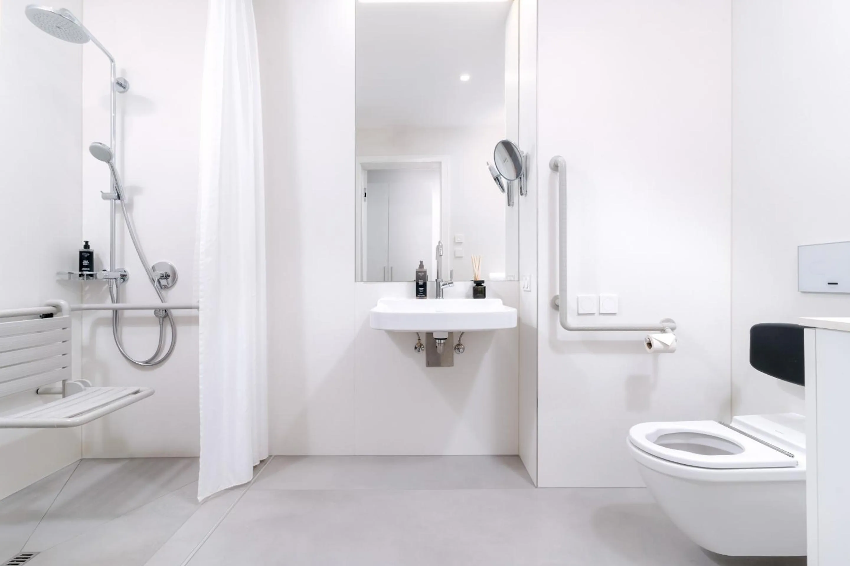 Shower in ARGOS Graz Serviced Apartments, kontaktlos mit Self Check-in