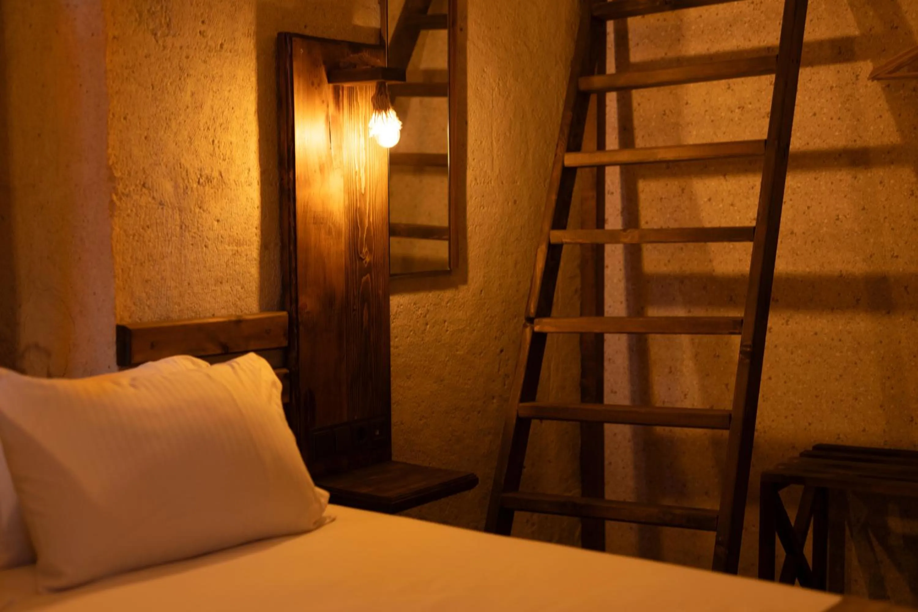 Decorative detail, Bed in Lemon Cave Suites