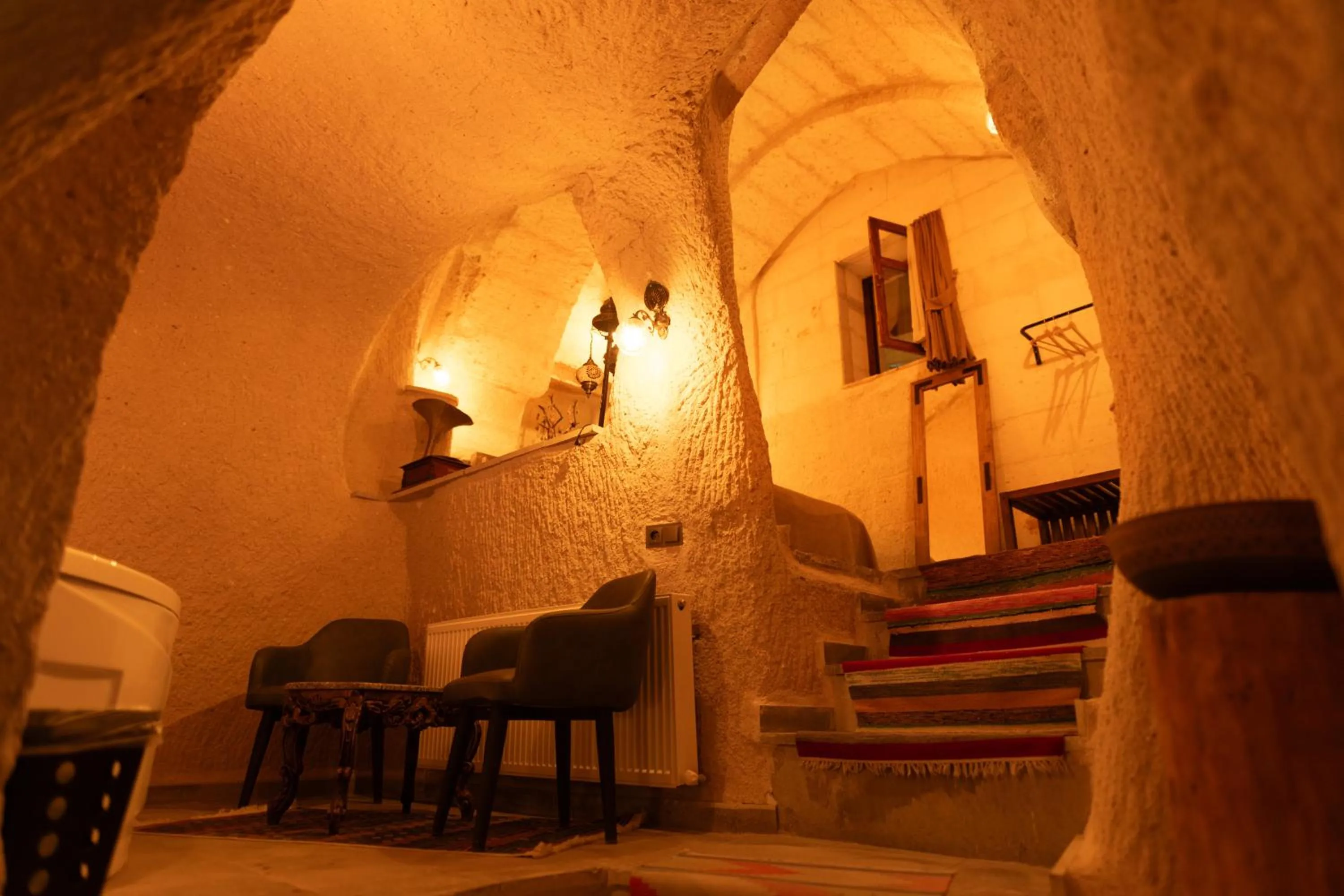 Seating area in Lemon Cave Suites