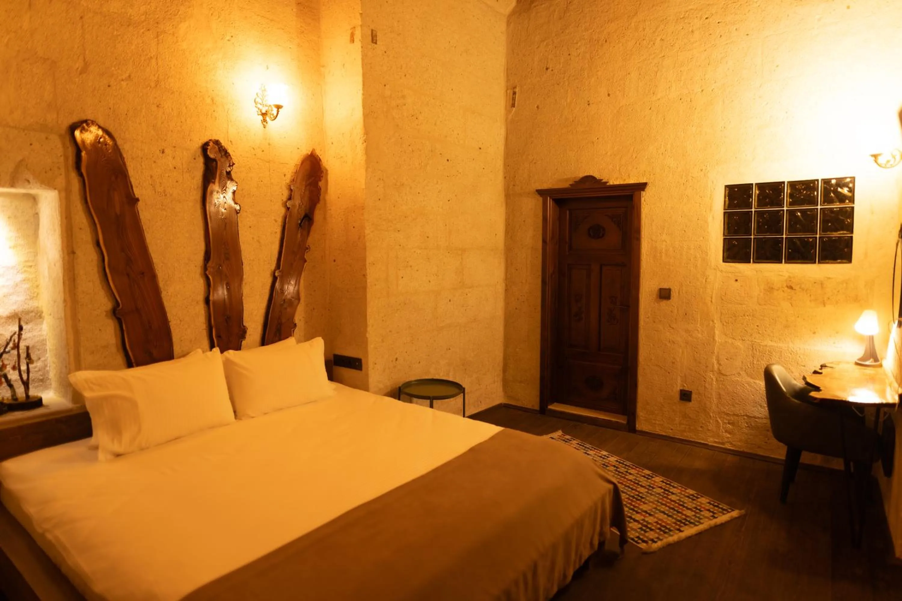 Bed in Lemon Cave Suites