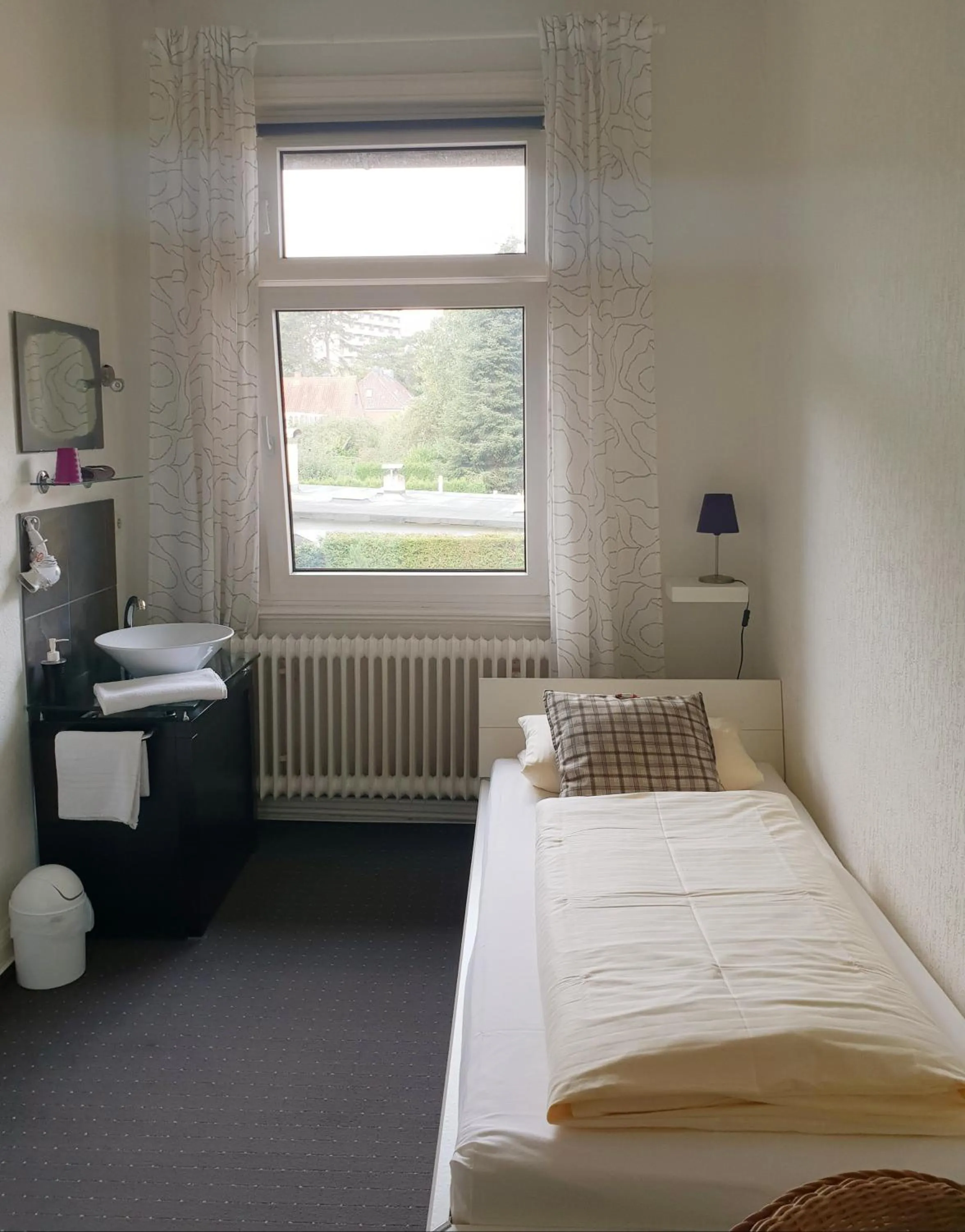 Photo of the whole room, Bed in Hotel Schweizerhaus