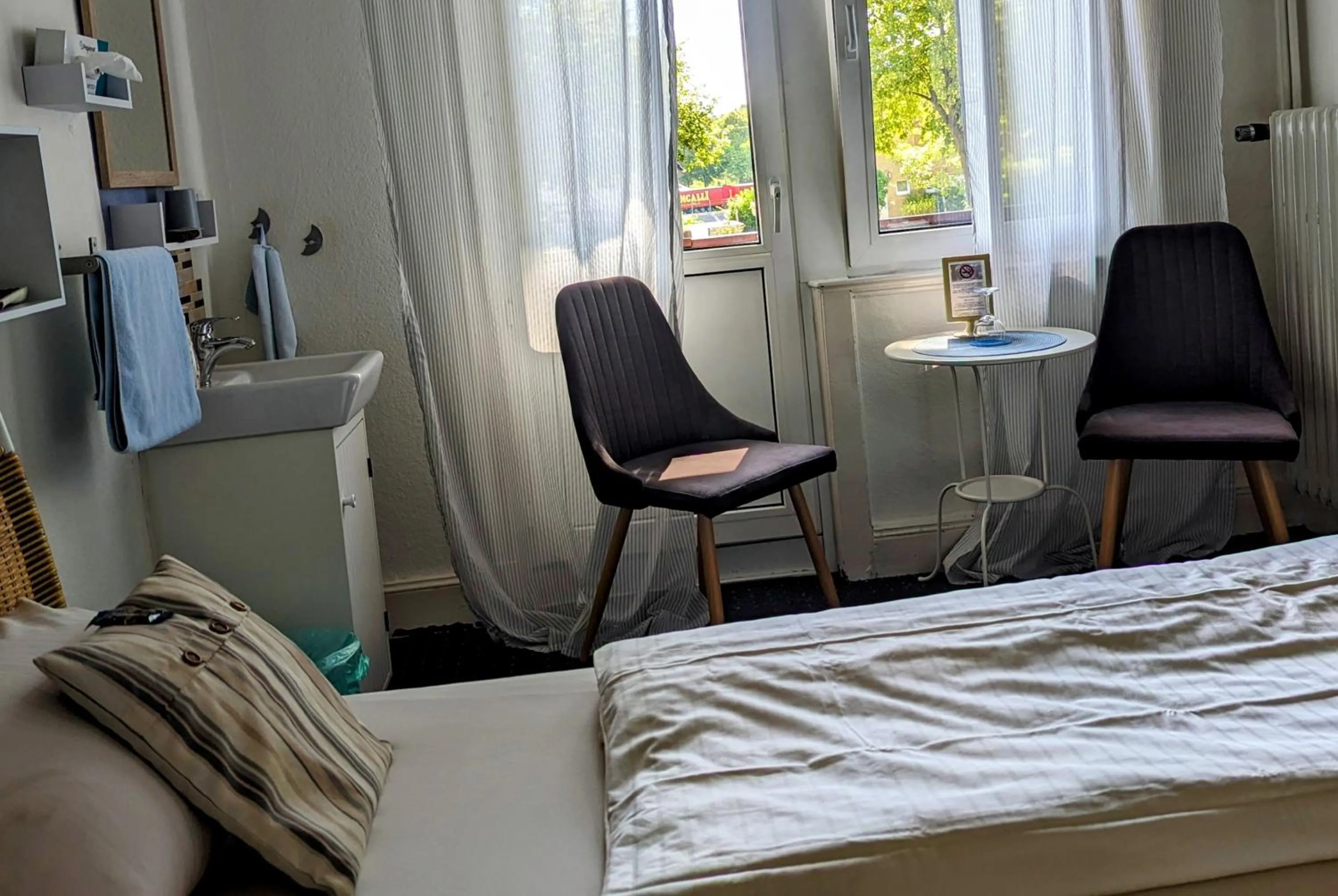 Seating area, Bed in Hotel Schweizerhaus