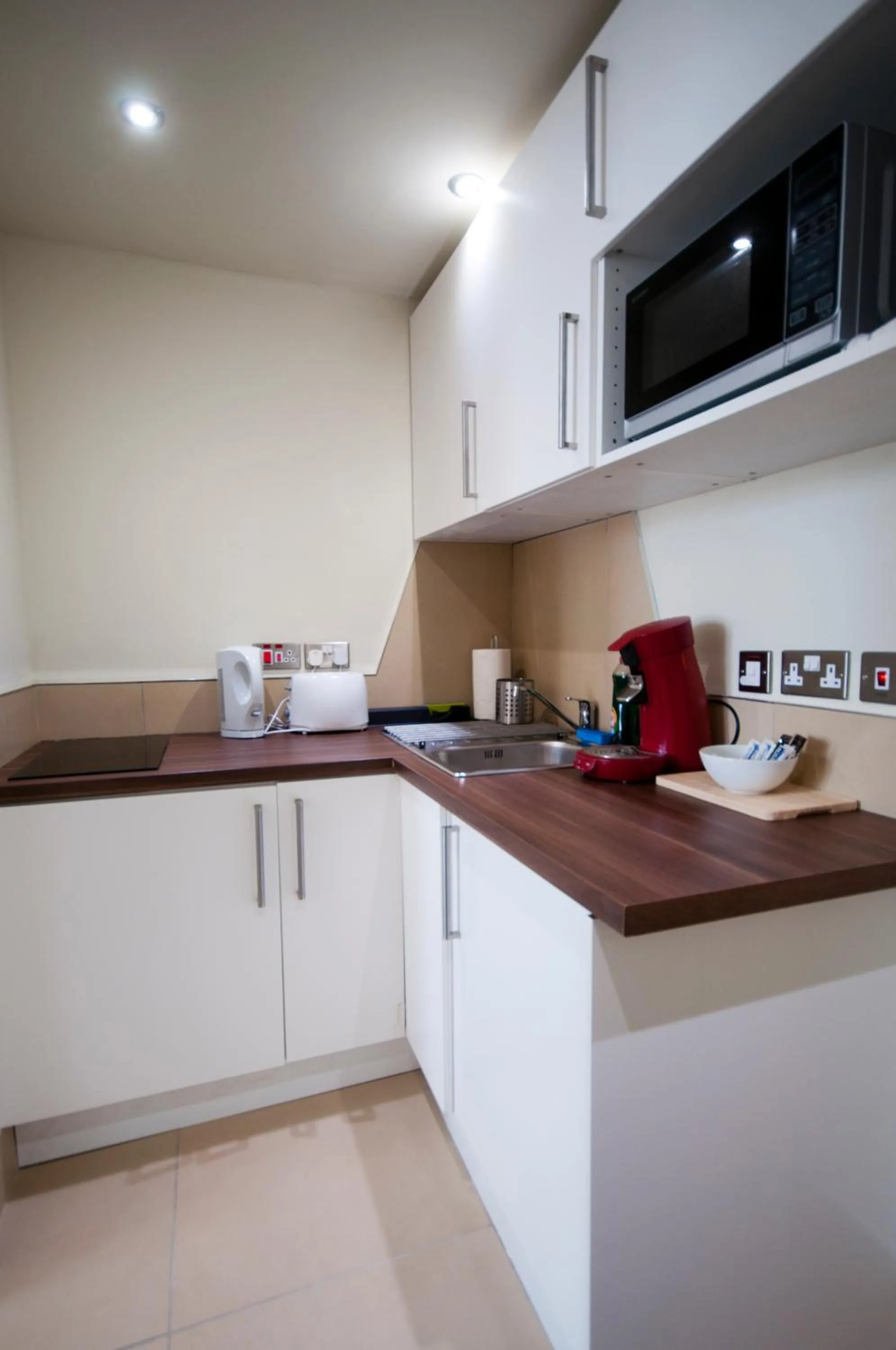 Kitchen or kitchenette in Palmerston Suites