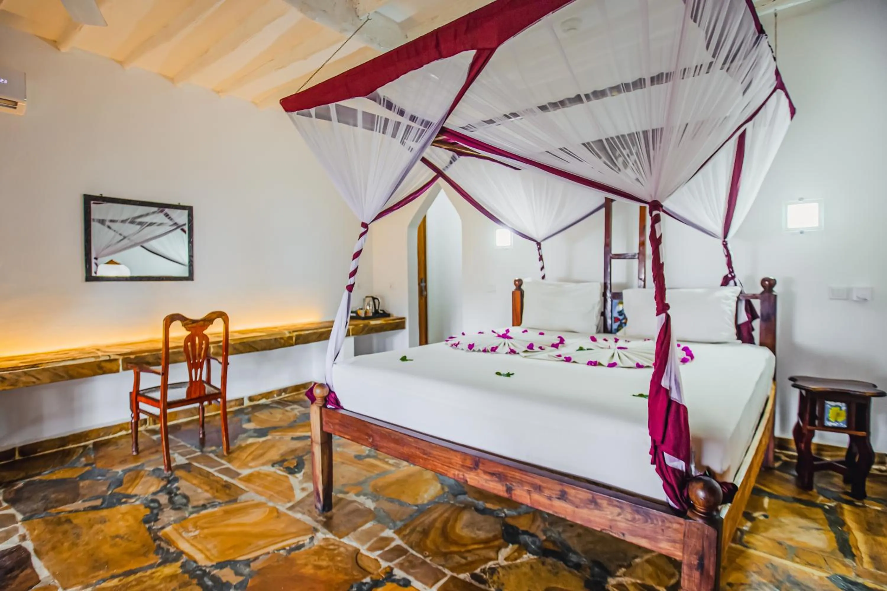 Bed in AHG Waridi Beach Resort & SPA