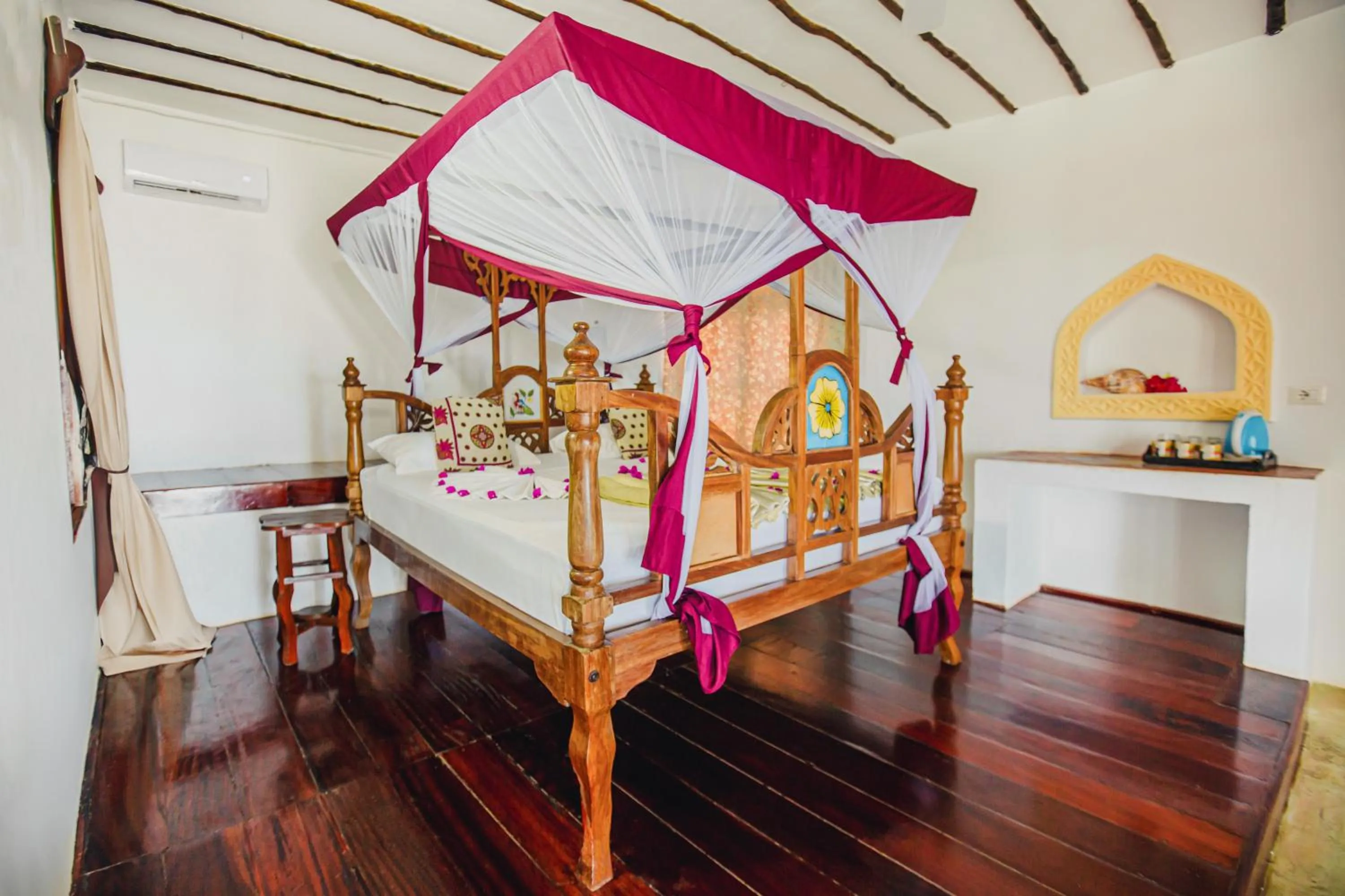 Bed in AHG Waridi Beach Resort & SPA