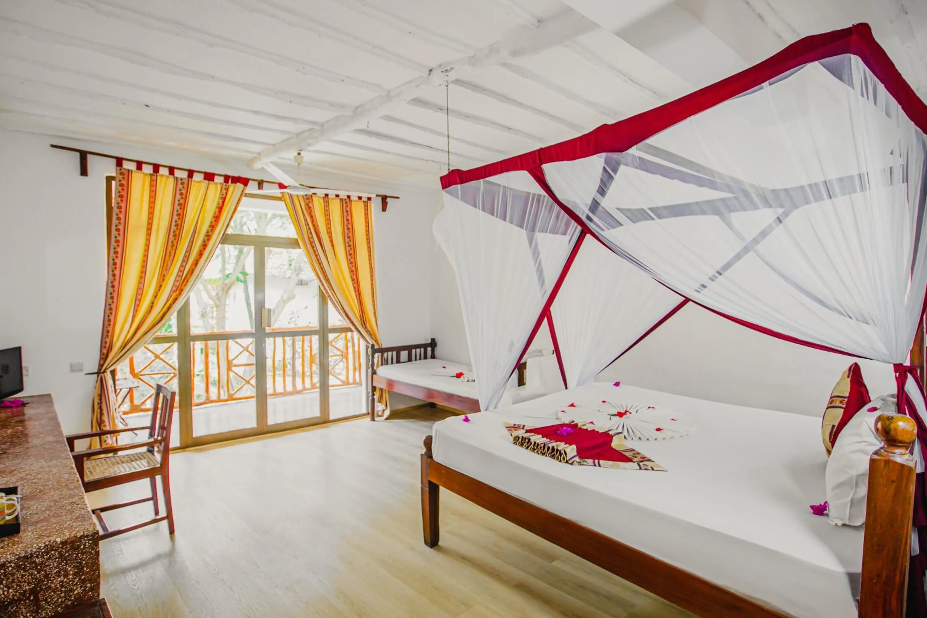 Bed in AHG Waridi Beach Resort & SPA