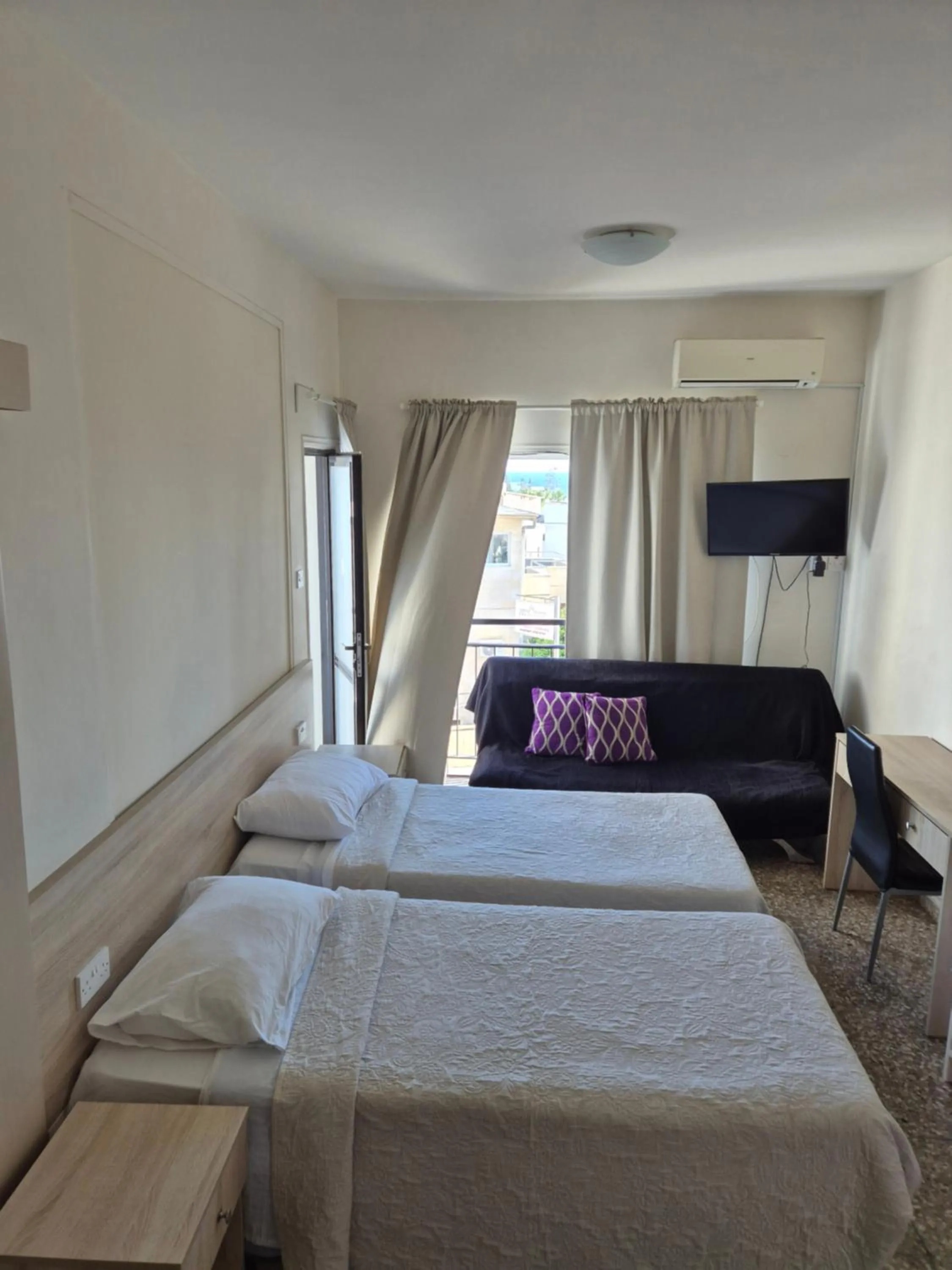Bed in Myriama Apartments