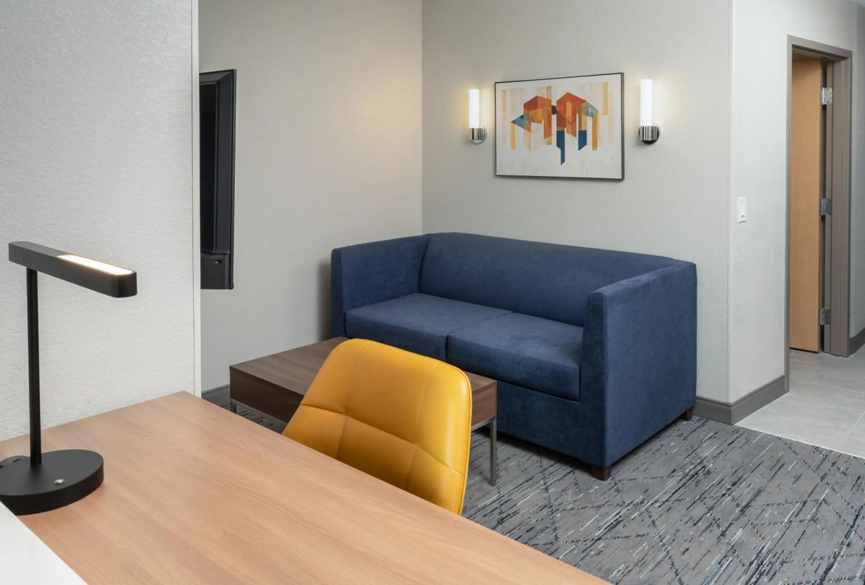 Living room in Holiday Inn Express Miami Airport-Blue Lagoon Area by IHG