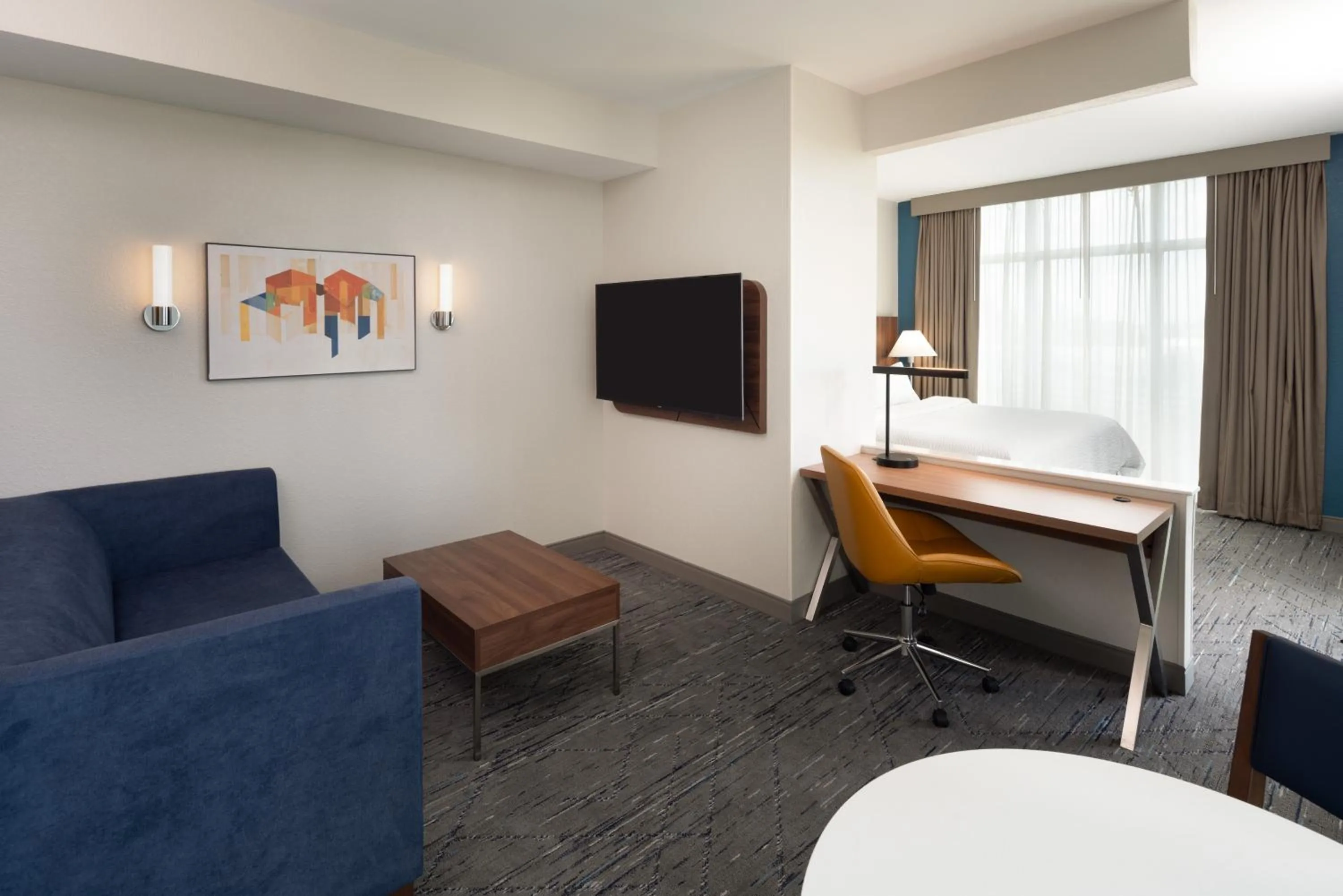 Living room in Holiday Inn Express Miami Airport-Blue Lagoon Area by IHG