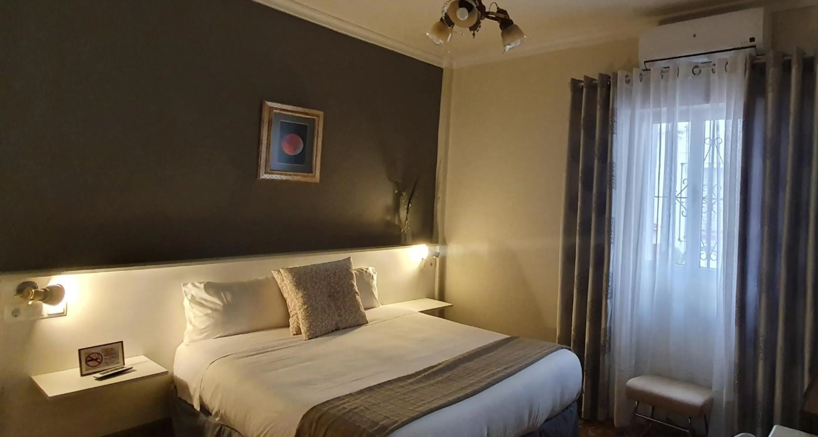 Bed in LUNA-Guest Rooms