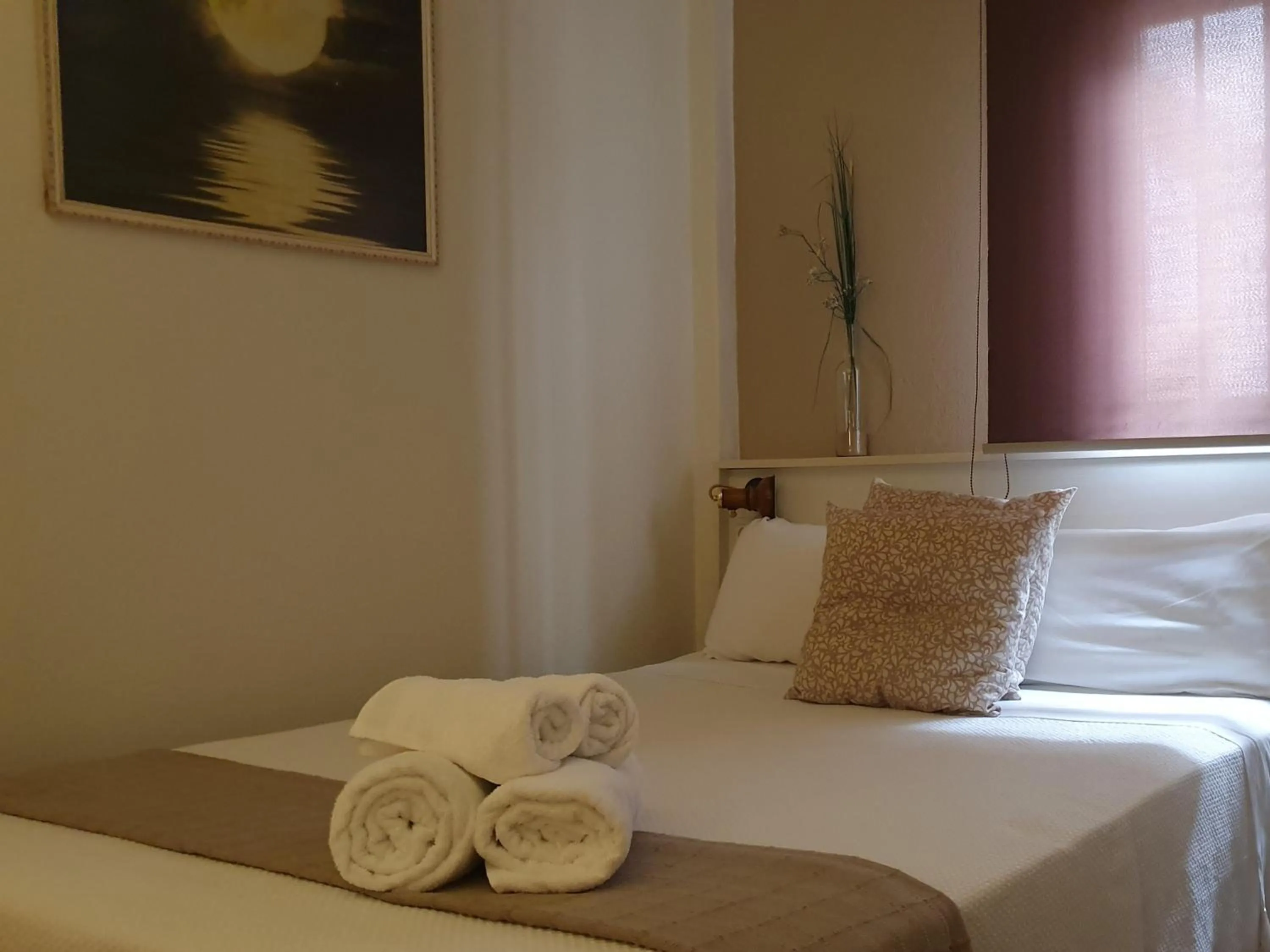 Bed in LUNA-Guest Rooms